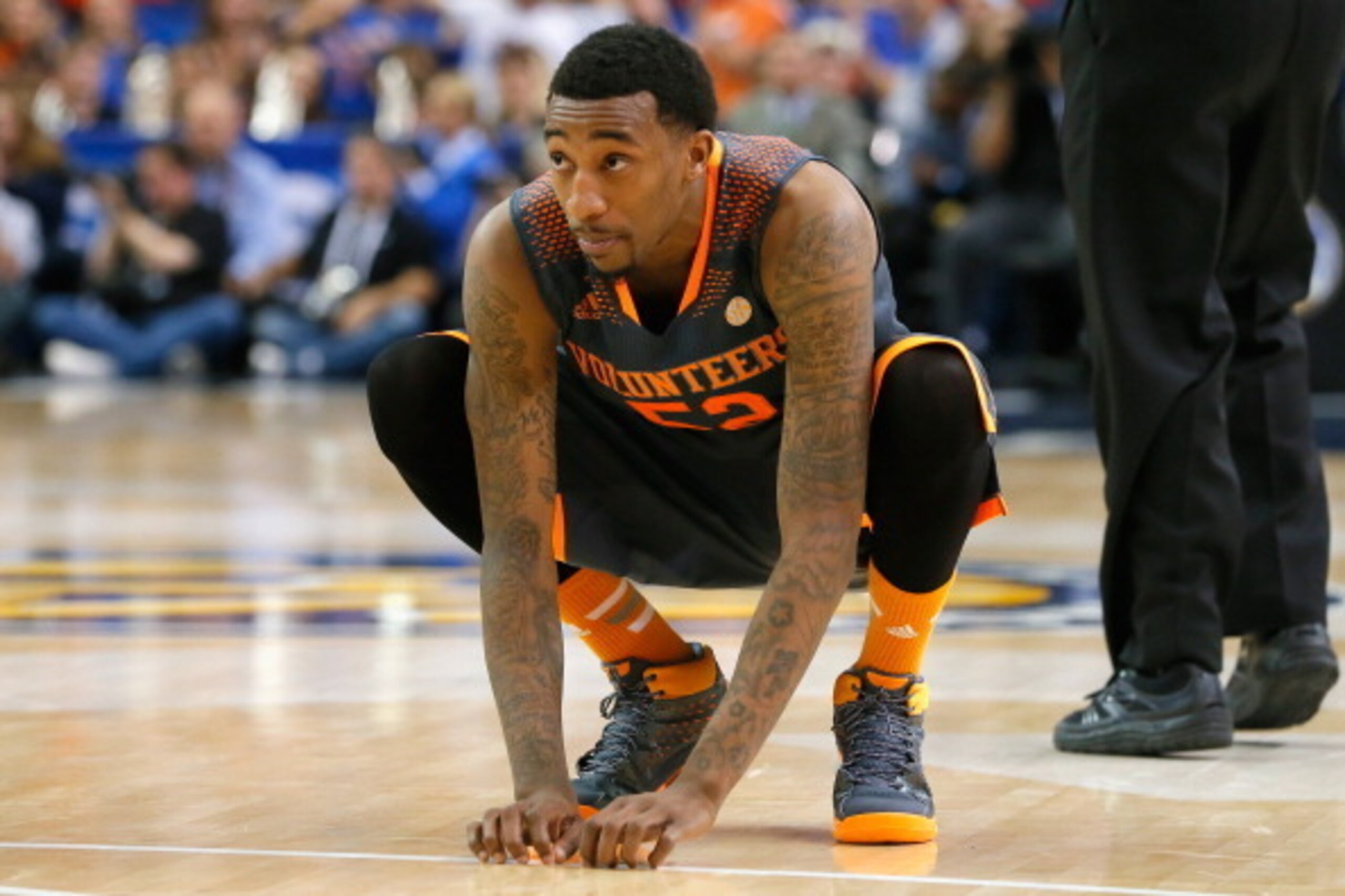 ATLANTA, GA - MARCH 15:  Jordan McRae #52 of the Tennessee Volunteers reacts in the final moments of the semifinals of the SEC Men's Basketball Tournament against the Florida Gators at Georgia Dome on March 15, 2014 in Atlanta, Georgia.  (Photo by Kevin C