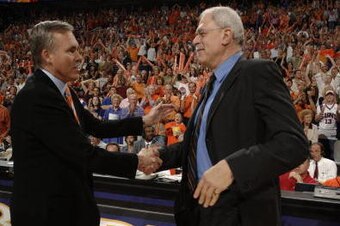 PHOENIX - MAY 6:  Los Angeles Lakers&#x27;  head coach Phil Jackson congratulates Phoenix Suns&#x27; head coack Mike D&#x27;Antoni after eliminating the Lakers in game seven of the Western Conference Quarterfinals during the 2006 NBA Playoffs on May 6, 2006, at U.S. Air