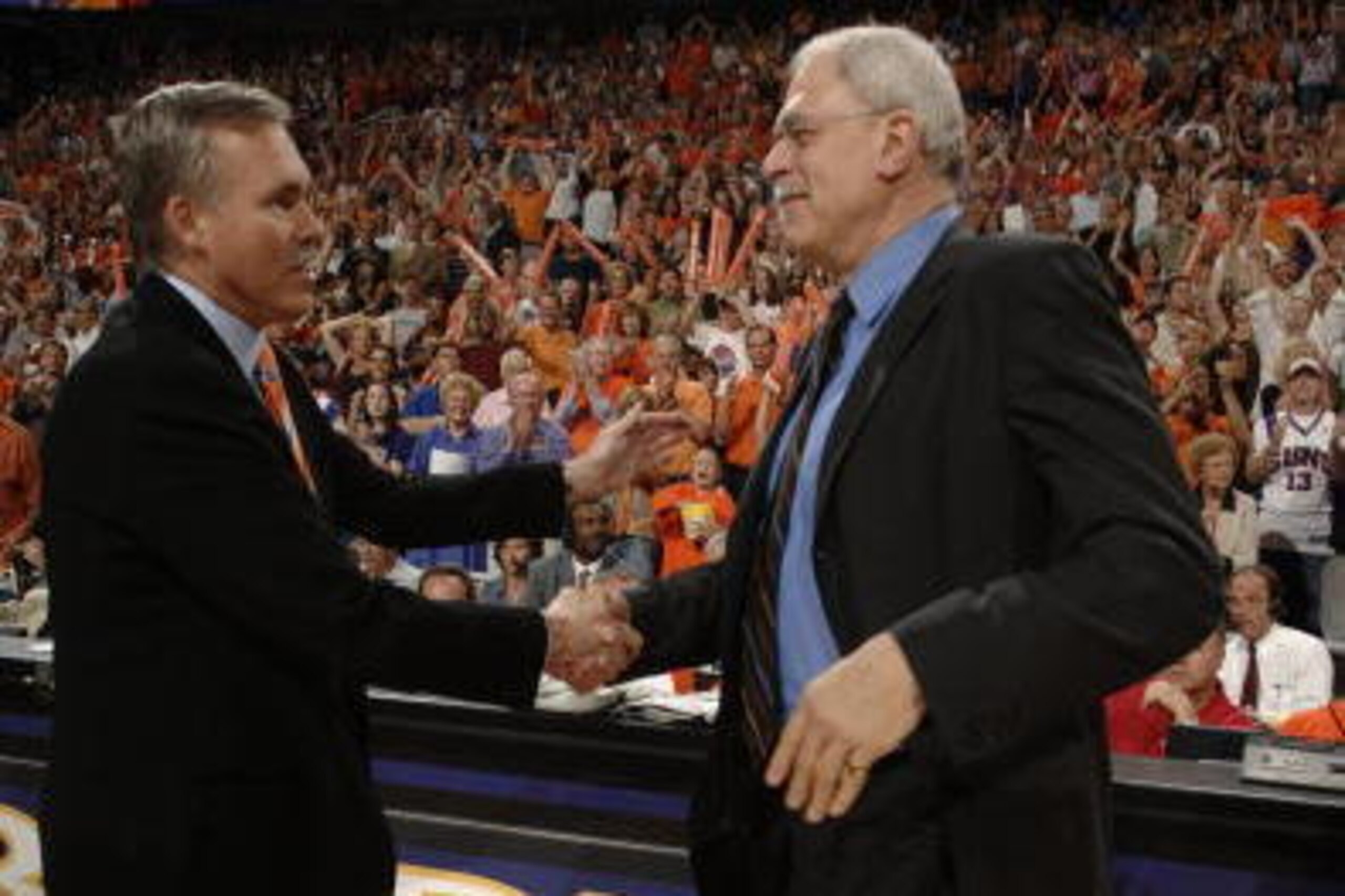 PHOENIX - MAY 6: Los Angeles Lakers' head coach Phil Jackson congratulates Phoenix Suns' head coack Mike D'Antoni after eliminating the Lakers in game seven of the Western Conference Quarterfinals during the 2006 NBA Playoffs on May 6, 2006, at U.S. Air PHOENIX - MAY 6: Los Angeles Lakers' head coach Phil Jackson congratulates Phoenix Suns' head coack Mike D'Antoni after eliminating the Lakers in game seven of the Western Conference Quarterfinals during the 2006 NBA Playoffs on May 6, 2006, at U.S. Air