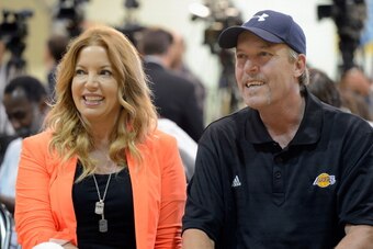 EL SEGUNDO, CA - AUGUST 10:  Jim Buss and his sister Jeanie Buss of the Los Angeles lakers attend a news conference where Dwight Howard was introduced as the newest member of the team at the Toyota Sports Center on August 10, 2012 in El Segundo, Californi