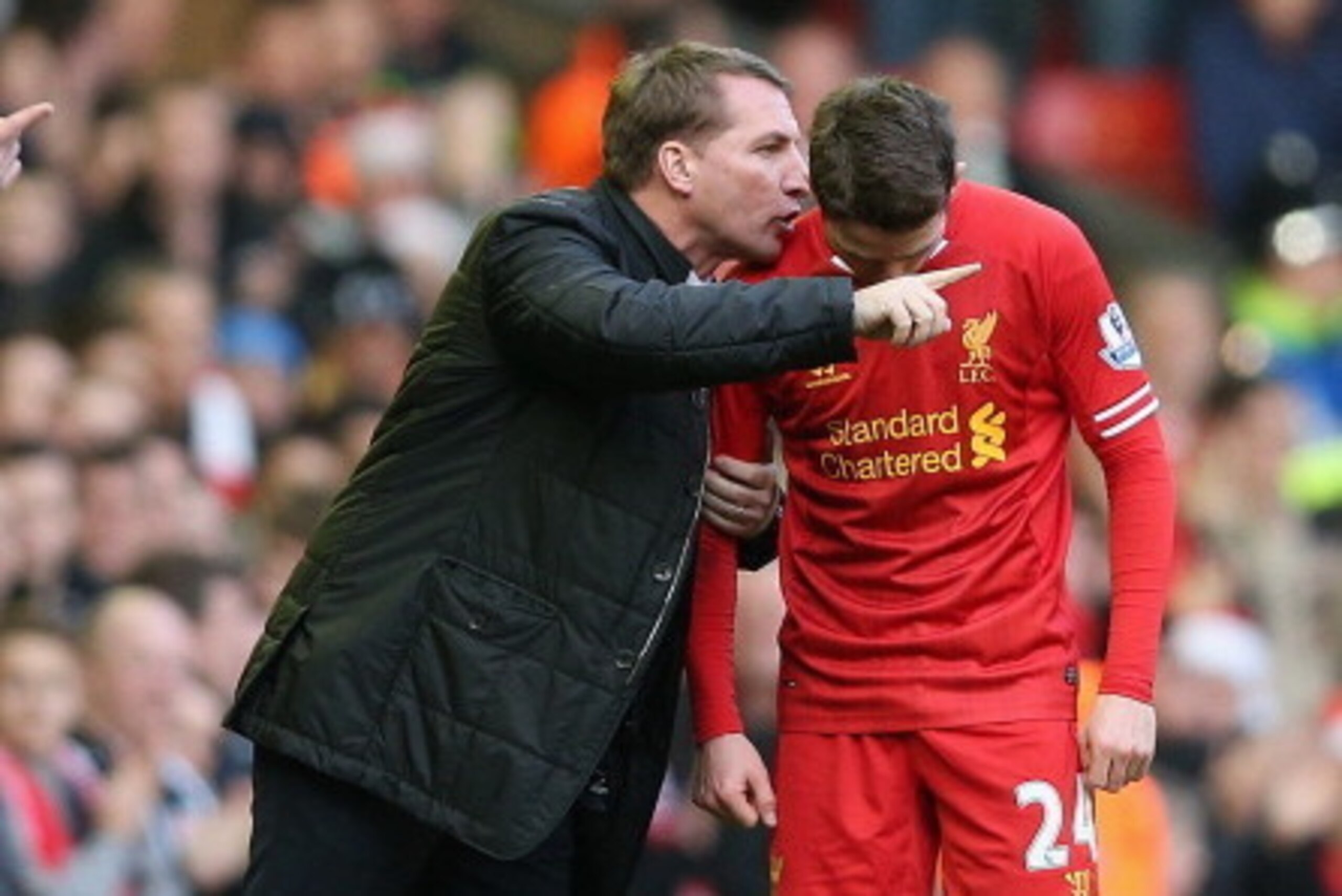 LIVERPOOL, ENGLAND - DECEMBER 21: Liverpool manager Brendan Rodgers speaks with Joe Allen during the Barclays Premier League match between Liverpool and Cardiff City at Anfield at Anfield on December 21, 2013 in Liverpool, England. (Photo by Clive Brun LIVERPOOL, ENGLAND - DECEMBER 21: Liverpool manager Brendan Rodgers speaks with Joe Allen during the Barclays Premier League match between Liverpool and Cardiff City at Anfield at Anfield on December 21, 2013 in Liverpool, England. (Photo by Clive Brun
