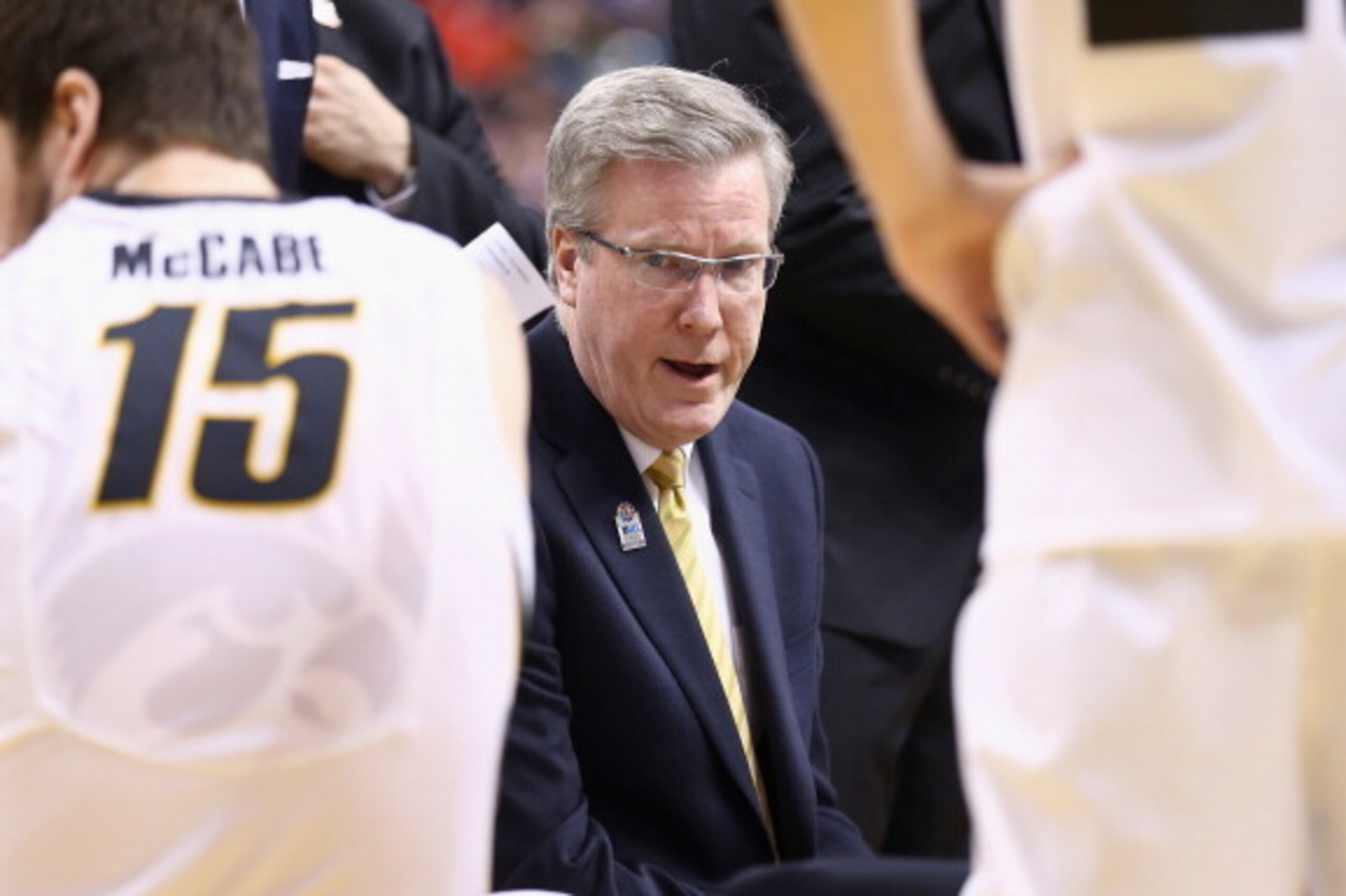 INDIANAPOLIS, IN - MARCH 13: Fran McCaffery the head coach of the Iowa Hawkeyes gives instructions to his team in the game against the Northwestern Wildcats during the first round of the Big Ten Basketball Tournament at Bankers Life Fieldhouse on March 1 INDIANAPOLIS, IN - MARCH 13: Fran McCaffery the head coach of the Iowa Hawkeyes gives instructions to his team in the game against the Northwestern Wildcats during the first round of the Big Ten Basketball Tournament at Bankers Life Fieldhouse on March 1