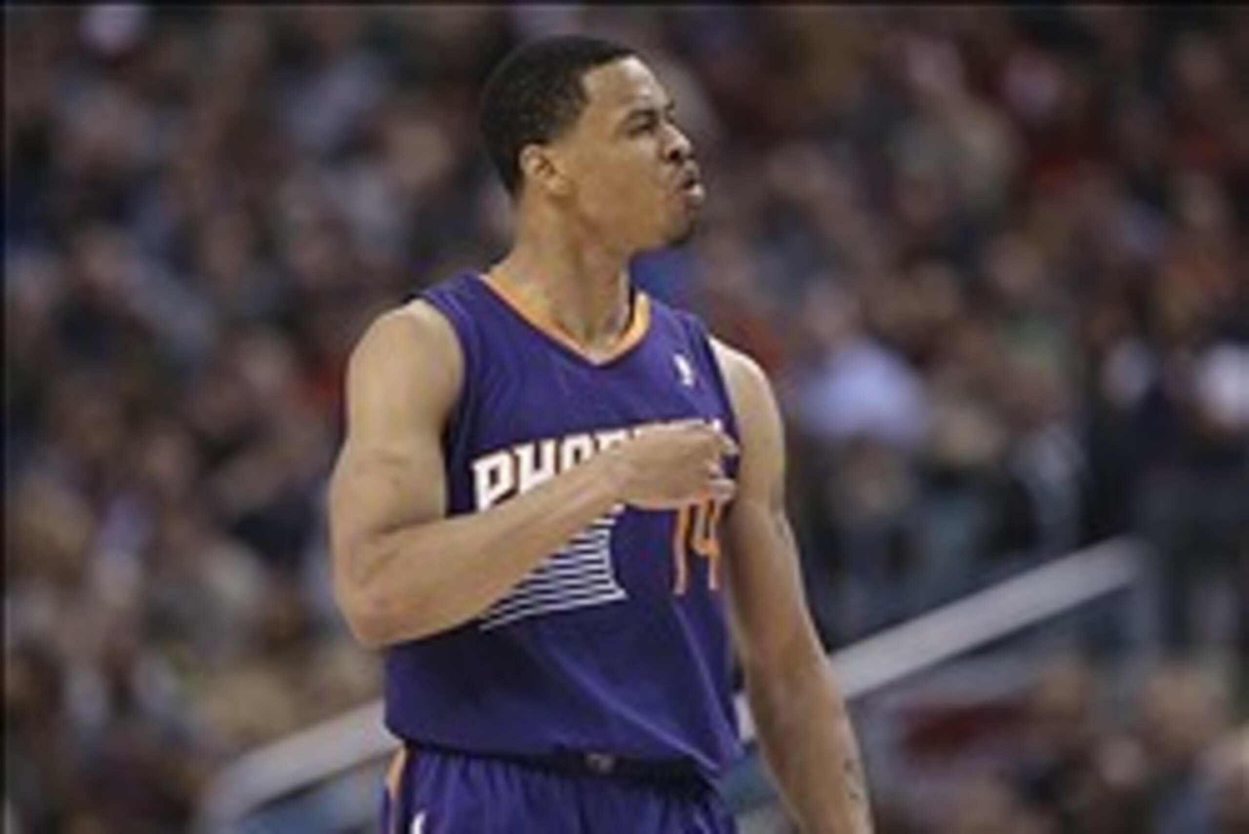 Mar 16, 2014; Toronto, Ontario, CAN; Phoenix Suns forward Gerald Green (14) is called for a technical as he celebrates his basket against the Toronto Raptors at Air Canada Centre. The Suns beat the Raptors 121-113. Mandatory Credit: Tom Szczerbowski-USA T