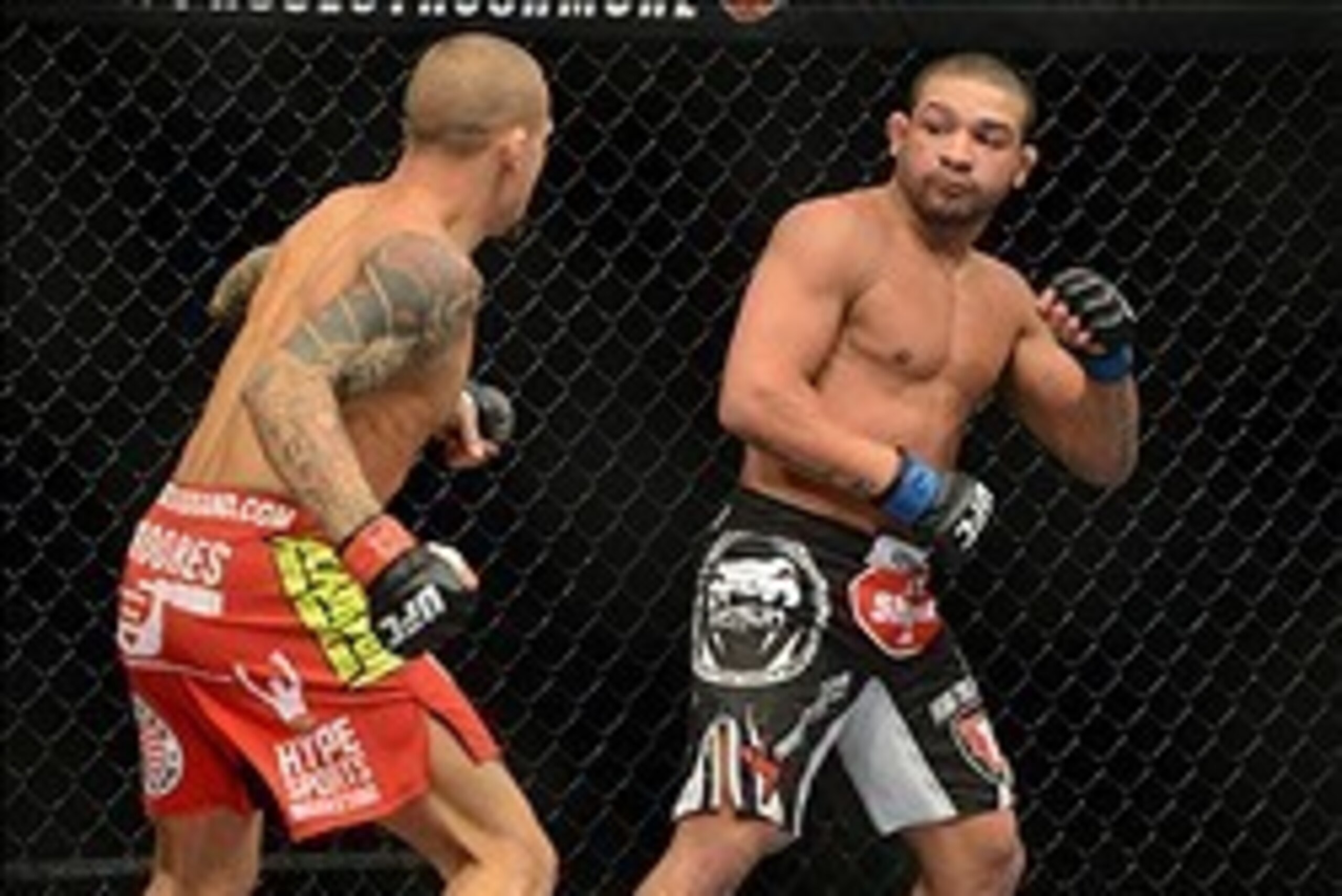 Dec 28, 2013; Las Vegas, NV, USA;    Dustin Poirier (red gloves) and Diego Brandao (blue gloves) fight during their UFC middleweight bout at the MGM Grand Garden Arena. Mandatory Credit: Jayne Kamin-Oncea-USA TODAY Sports