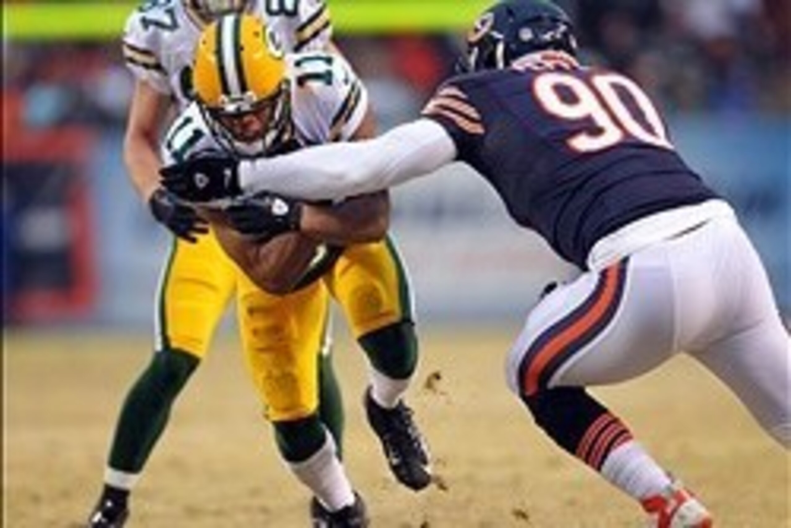 Dec 29, 2013; Chicago, IL, USA; Green Bay Packers wide receiver Jarrett Boykin (11) is pursued by Chicago Bears defensive end Julius Peppers (90) during the first quarter at Soldier Field. Mandatory Credit: Dennis Wierzbicki-USA TODAY Sports