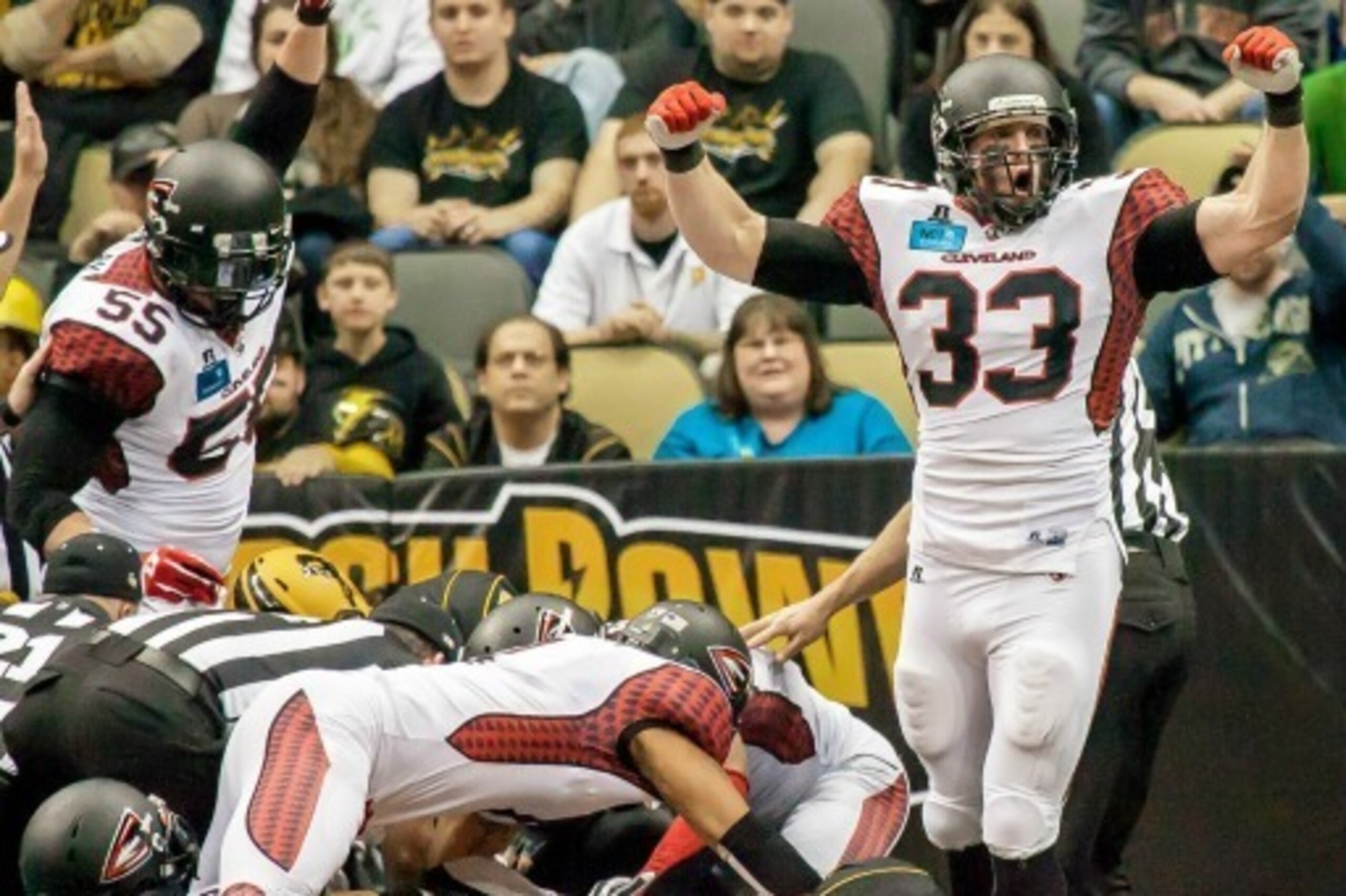 Mac linebacker Brian Brikowski celebrates a second-half fumble recovery by the Cleveland Gladiators. Mac linebacker Brian Brikowski celebrates a second-half fumble recovery by the Cleveland Gladiators.