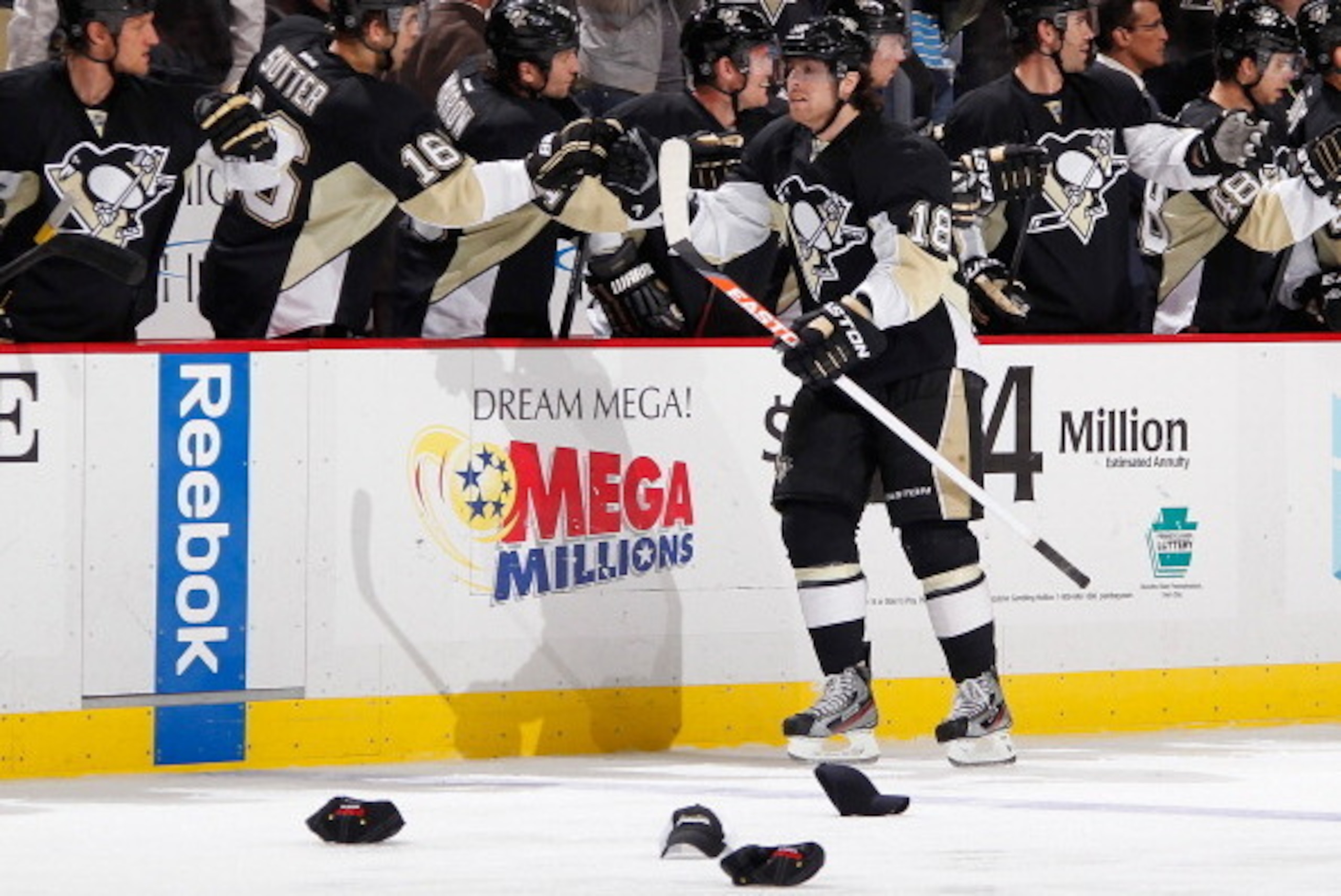 PITTSBURGH, PA - APRIL 27:  James Neal #18 of the Pittsburgh Penguins celebrates his hat trick goal with the bench during the game against the Carolina Hurricanes on April 27, 2013 at Consol Energy Center in Pittsburgh, Pennsylvania.  (Photo by Gregory Sh