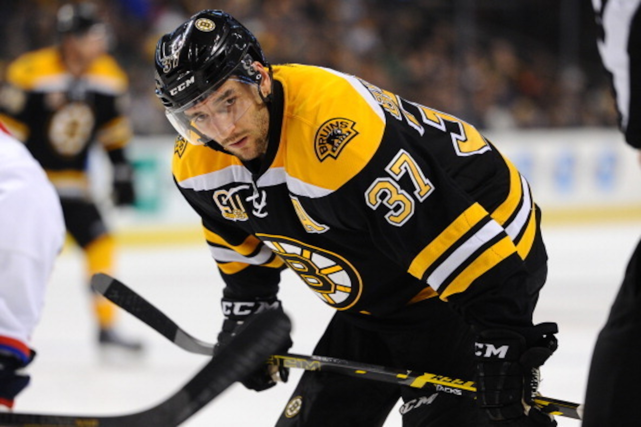 BOSTON, MA - MARCH 6: Patrice Bergeron #37 of the Boston Bruins waits for a face off against the Washington Capitals at the TD Garden on March 6, 2014 in Boston, Massachusetts.  (Photo by Brian Babineau/NHLI via Getty Images)