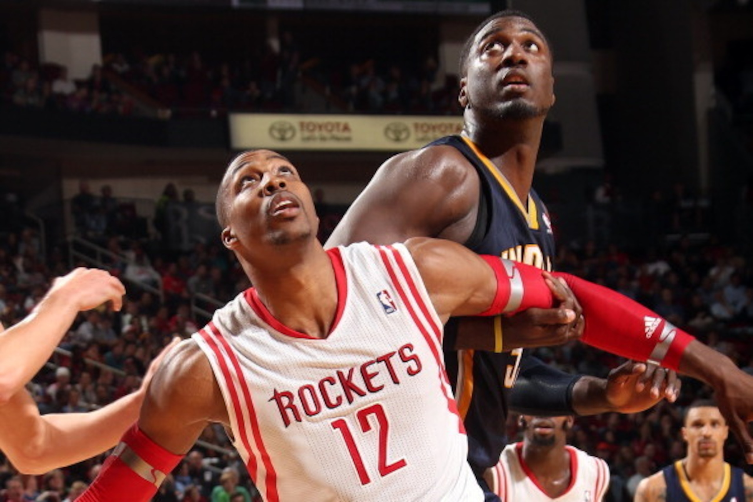 HOUSTON, TX - DECEMBER 28: Dwight Howard #12 of the Houston Rockets battles for rebound position against the Indiana Pacers on March 7, 2014 at the Toyota Center in Houston, Texas. NOTE TO USER: User expressly acknowledges and agrees that, by downloading 