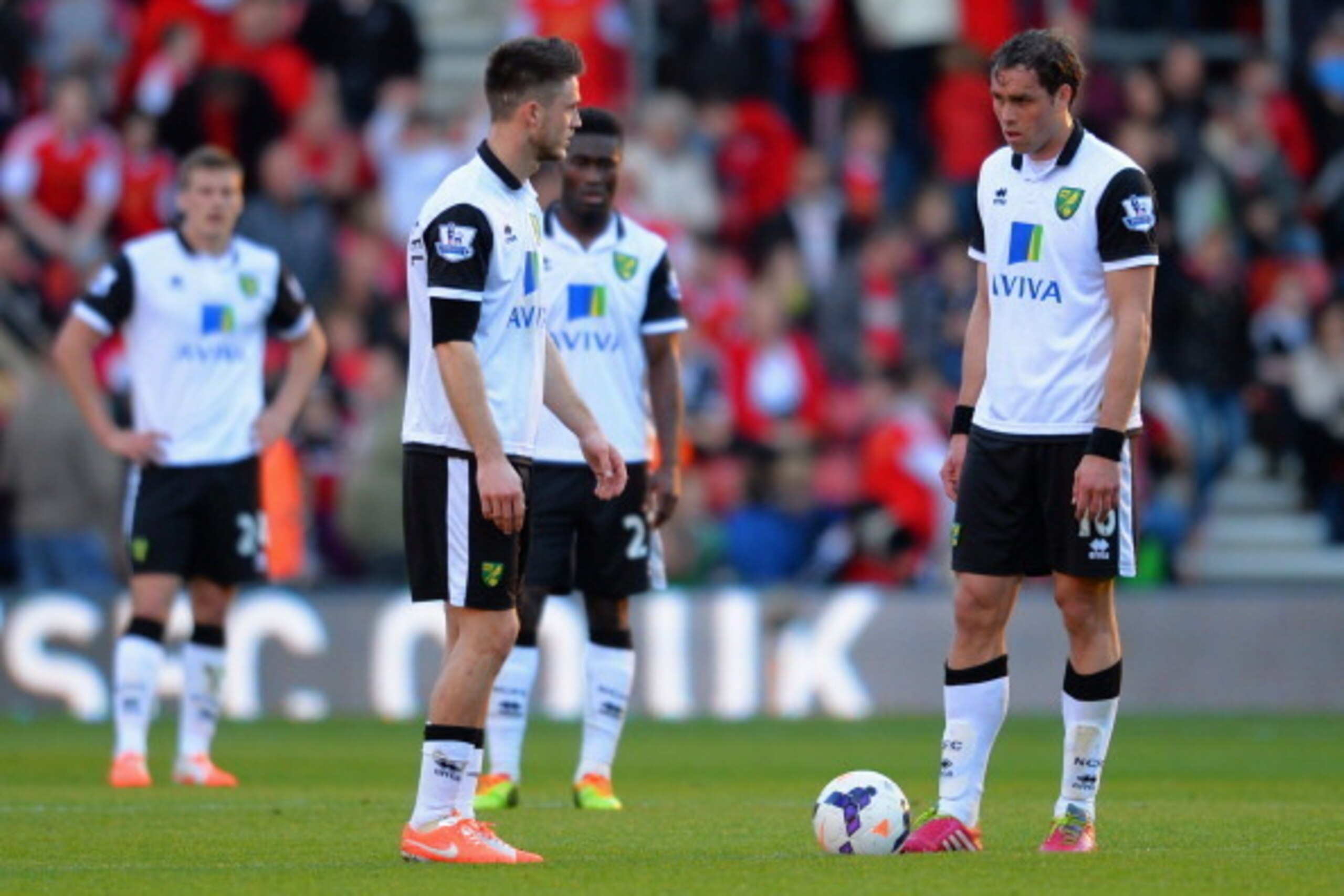 SOUTHAMPTON, ENGLAND - MARCH 15:  Dejected Ricky van Wolfswinkel of Norwich City and Johan Elmander of Norwich City after Southampton's fourth goal during the Barclays Premier League match between Southampton and Norwich City at St Mary's Stadium on March
