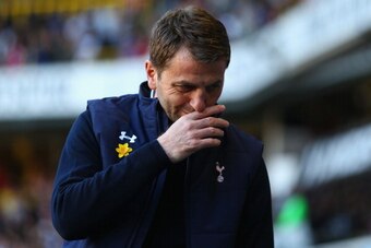 LONDON, ENGLAND - MARCH 16:  Tim Sherwood manager of Tottenham Hotspur wipes his face during the Barclays Premier League match between Tottenham Hotspur and Arsenal at White Hart Lane on March 16, 2014 in London, England.  (Photo by Paul Gilham/Getty Imag