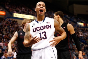 HARTFORD, CT - DECEMBER 18: Shabazz Napier #13 of the Connecticut Huskies reacts following a non-call in the second half against the Stanford Cardinal during the game at XL Center on December 18, 2013 in Hartford, Connecticut.  (Photo by Jared Wickerham/G