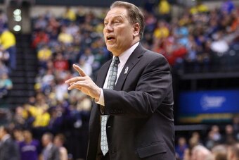 INDIANAPOLIS, IN - MARCH 14:  Tom Izzo the head coach of the Michigan State Spartans gives instructions to his team in the game against the Northwestern Wildcats during the Quarterfinals of the Big Ten Basketball Tournament at Bankers Life Fieldhouse on M