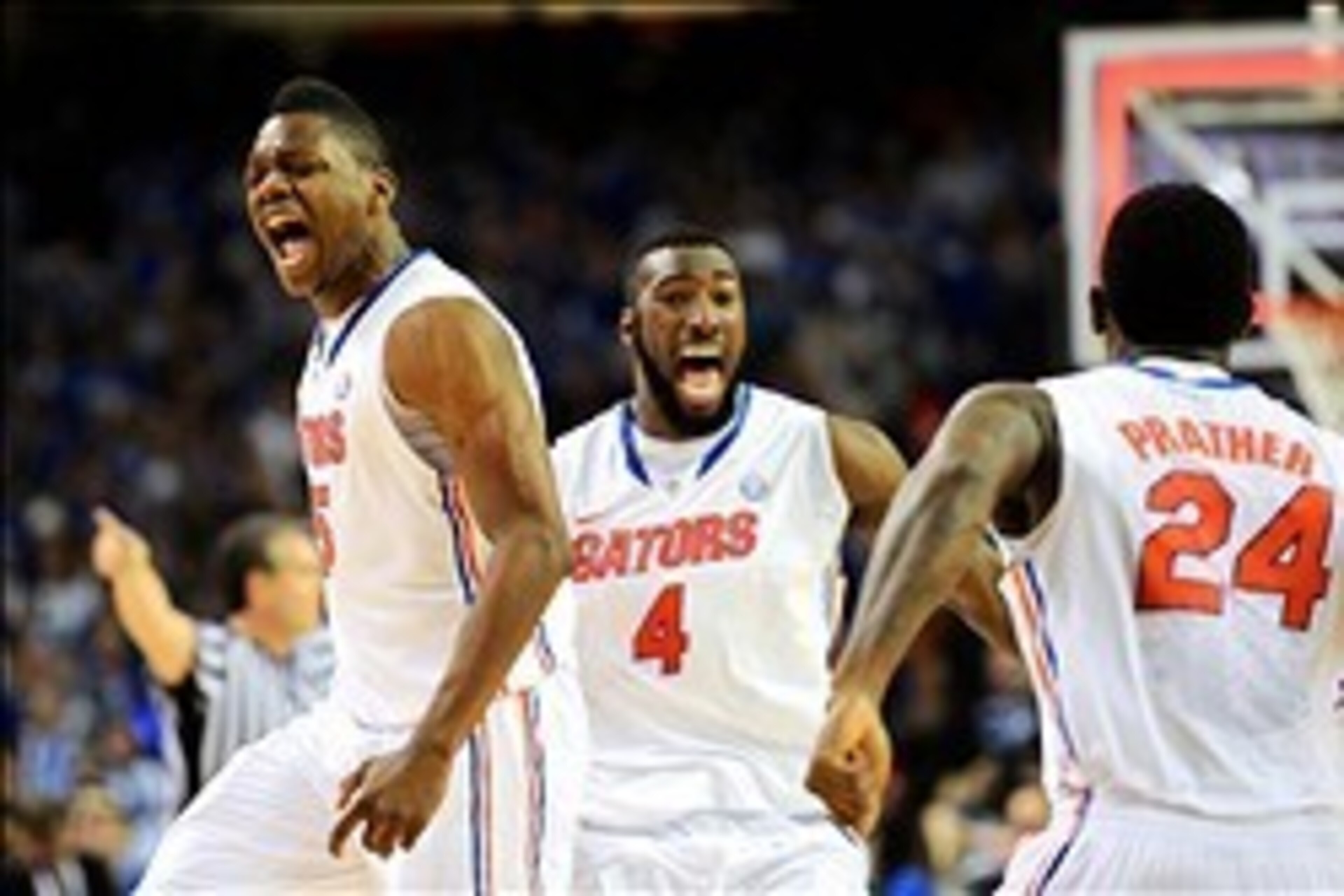 Mar 16, 2014; Atlanta, GA, USA; Florida Gators forward Will Yeguete (15) center Patric Young (4) and forward Casey Prather (24) react as time expires and their team defeat the Kentucky Wildcats in the championship game for the SEC college basketball tourn Mar 16, 2014; Atlanta, GA, USA; Florida Gators forward Will Yeguete (15) center Patric Young (4) and forward Casey Prather (24) react as time expires and their team defeat the Kentucky Wildcats in the championship game for the SEC college basketball tourn