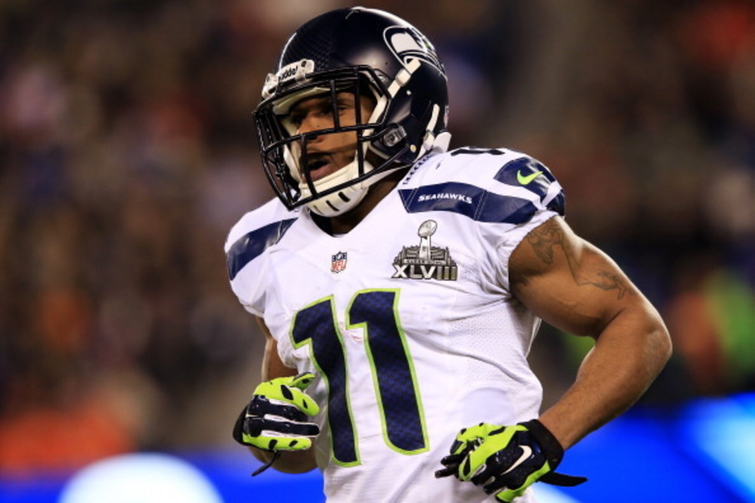EAST RUTHERFORD, NJ - FEBRUARY 02:  Wide receiver Percy Harvin #11 of the Seattle Seahawks runs during Super Bowl XLVIII against Denver Broncos at MetLife Stadium on February 2, 2014 in East Rutherford, New Jersey. The Seattle Seahawks won 43-8. (Photo by