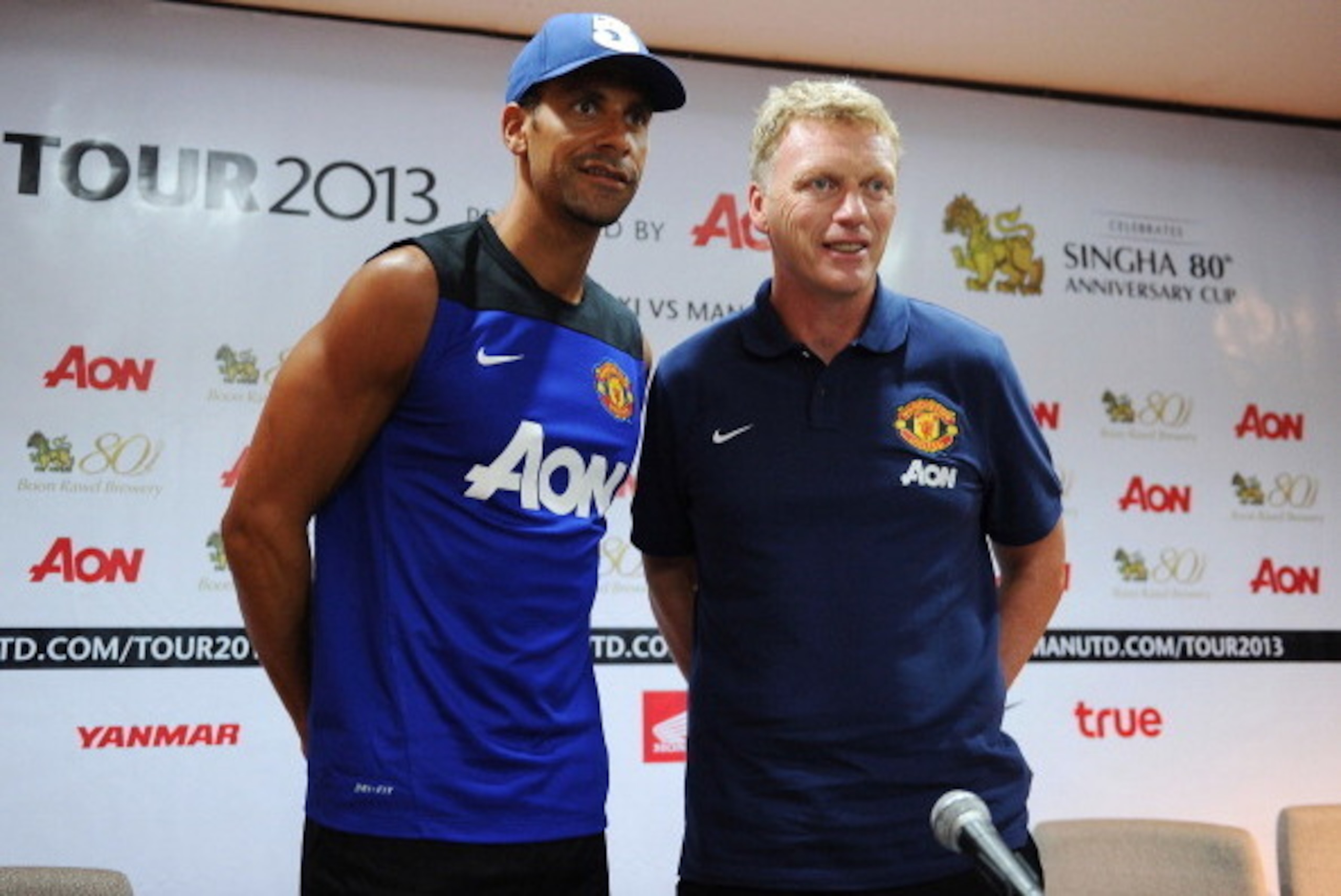 BANGKOK, THAILAND - JULY 12: Rio Ferdinand and manager David Moyes (R) attend a Manchester United press conference at Rajamangala Stadium on July 12, 2013 in Bangkok, Thailand. (Photo by Thananuwat Srirasant/Getty Images) BANGKOK, THAILAND - JULY 12: Rio Ferdinand and manager David Moyes (R) attend a Manchester United press conference at Rajamangala Stadium on July 12, 2013 in Bangkok, Thailand. (Photo by Thananuwat Srirasant/Getty Images)