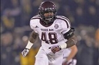 Nov 30, 2013; Columbia, MO, USA; Texas A&M Aggies linebacker Darian Claiborne (48) gets set on defense against the Missouri Tigers during the second half at Faurot Field. Mandatory Credit: Peter G. Aiken-USA TODAY Sports