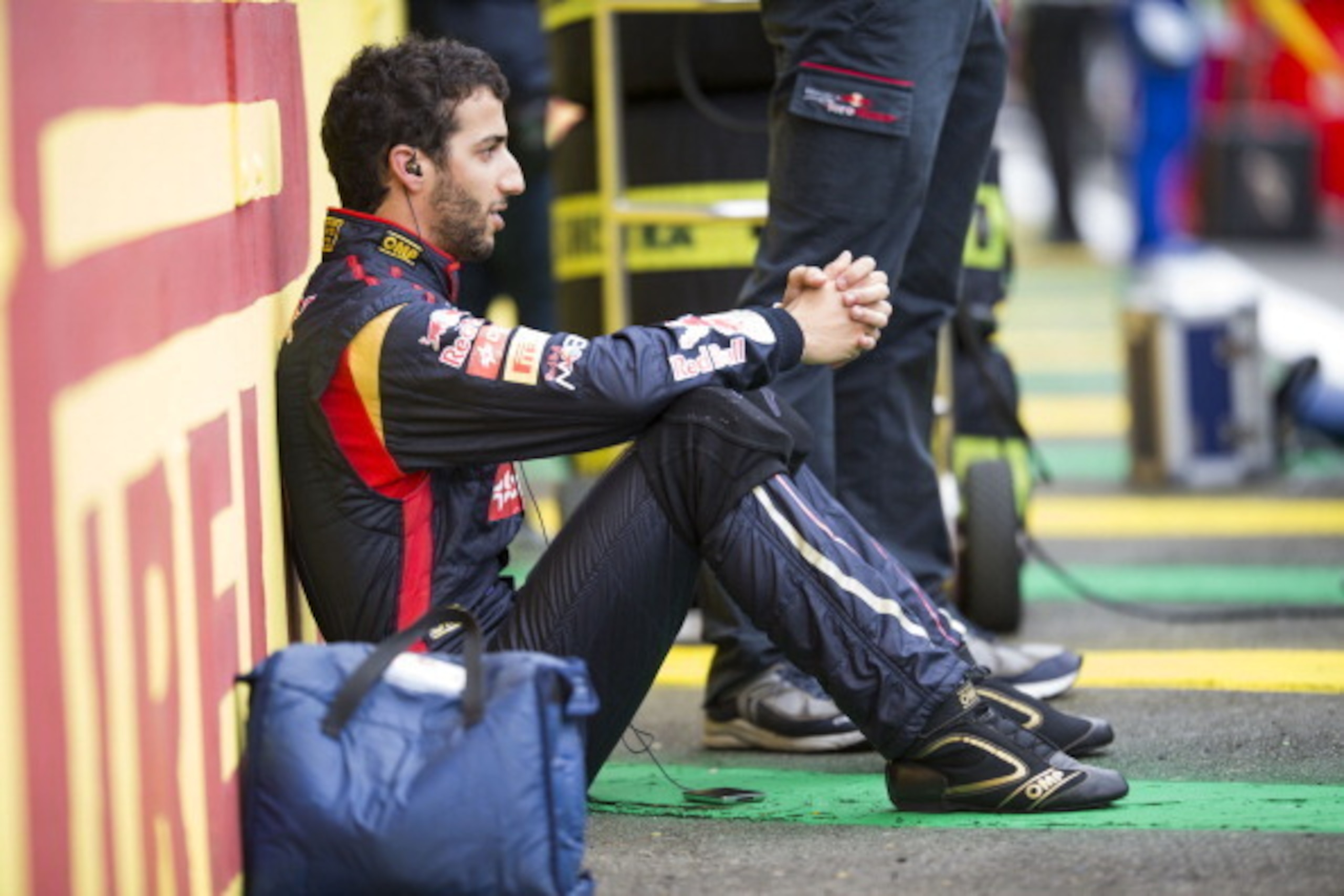 SAO PAULO, BRAZIL - NOVEMBER 24:  Daniel Ricciardo of Australia and Scuderia Toro Rosso prepares to drive in his final race before joining Infiniti Red Bull Racing next season at the Brazilian Formula One Grand Prix at Autodromo Jose Carlos Pace on Novemb