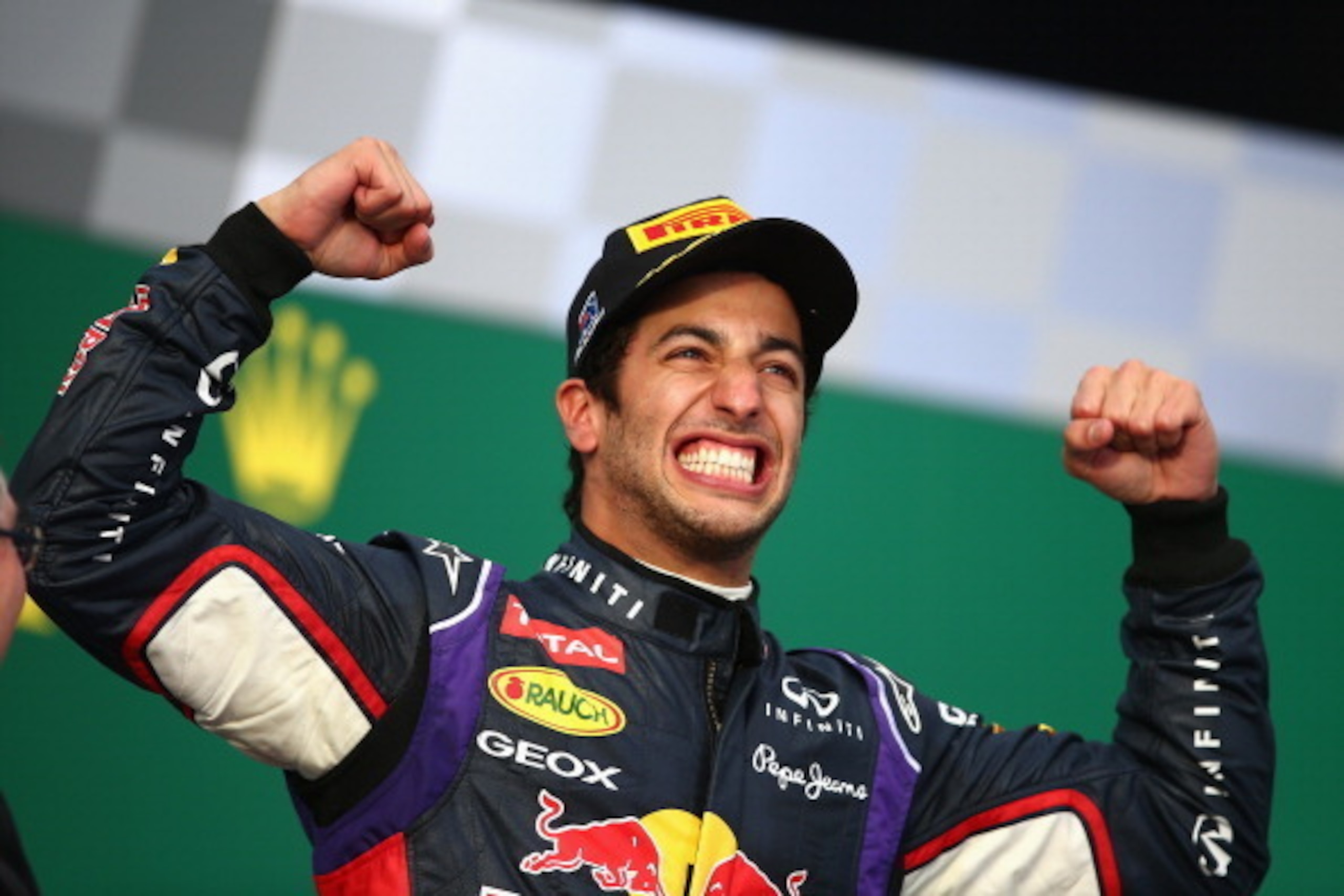 MELBOURNE, AUSTRALIA - MARCH 16:  Daniel Ricciardo of Australia and Infiniti Red Bull Racing celebrates on the podium after finishing second during the Australian Formula One Grand Prix at Albert Park on March 16, 2014 in Melbourne, Australia.  (Photo by 