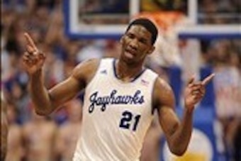 Feb 22, 2014; Lawrence, KS, USA; Kansas Jayhawks center Joel Embiid (21) celebrates after scoring in the first half against the Texas Longhorns at Allen Fieldhouse. Mandatory Credit: Denny Medley-USA TODAY Sports