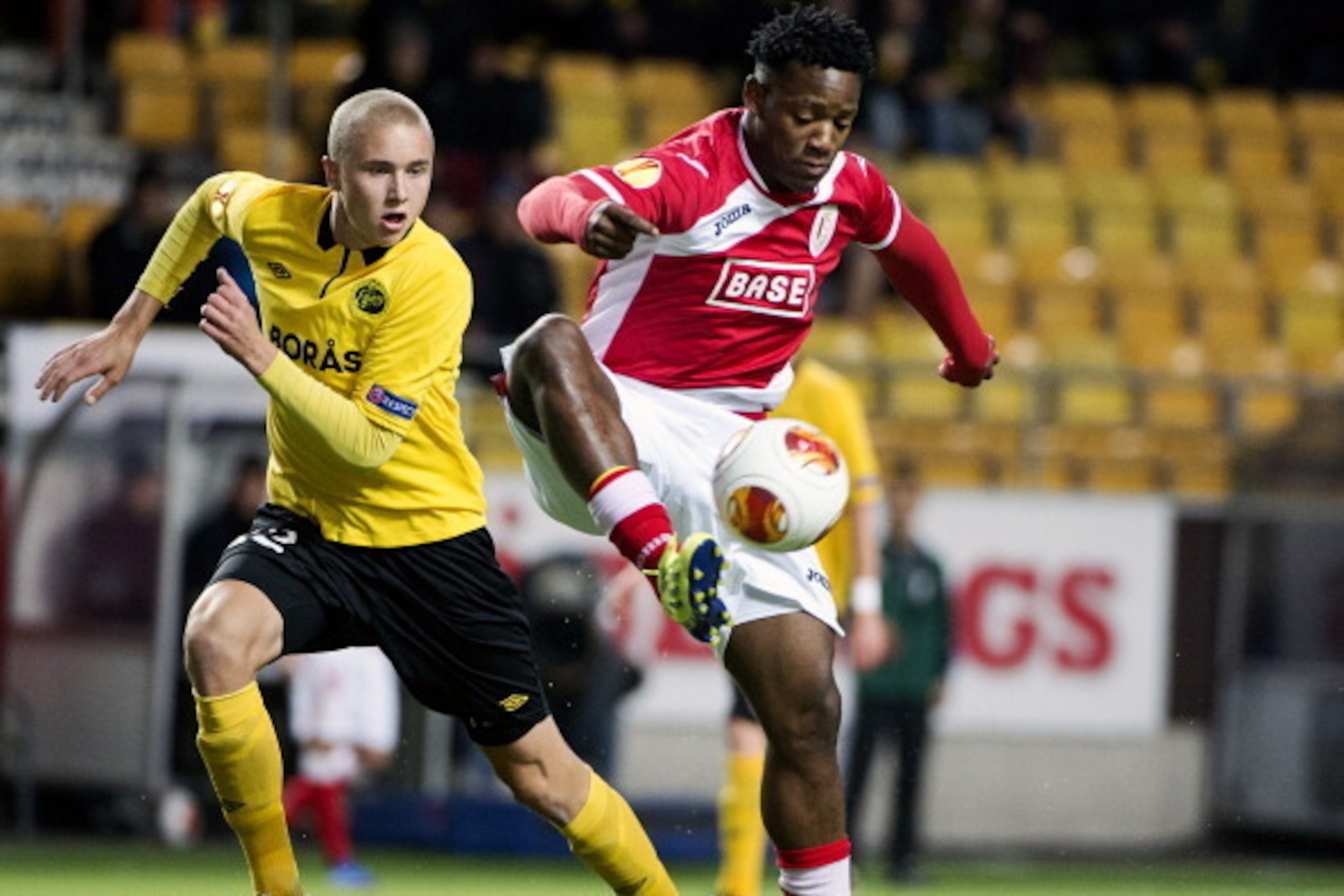 BORAS, SWEDEN - OCTOBER 3:  Sebastian Holmen (L) of IF Elfsborg challenges Michy Batshuayi of R. Standard de Liege during the UEFA Europa League group stage match between IF Elfsborg and R. Standard de Liege held on October 3, 2013 at the Boras Arena, in 