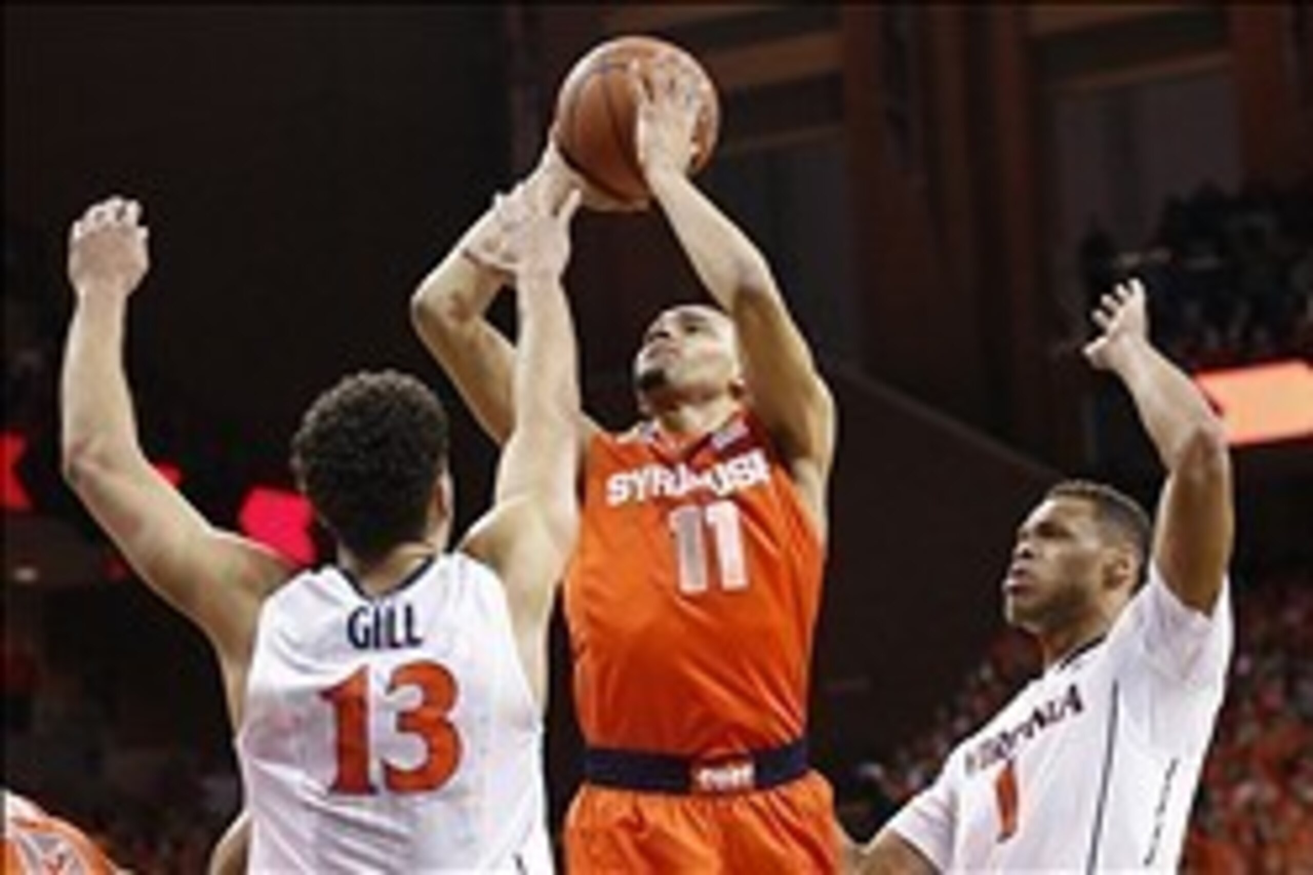 Mar 1, 2014; Charlottesville, VA, USA; Syracuse Orange guard Tyler Ennis (11) shoots the ball in front of Virginia Cavaliers forward Anthony Gill (13) and Cavaliers guard Justin Anderson (1) in the first half at John Paul Jones Arena. Mandatory Credit: Ge Mar 1, 2014; Charlottesville, VA, USA; Syracuse Orange guard Tyler Ennis (11) shoots the ball in front of Virginia Cavaliers forward Anthony Gill (13) and Cavaliers guard Justin Anderson (1) in the first half at John Paul Jones Arena. Mandatory Credit: Ge