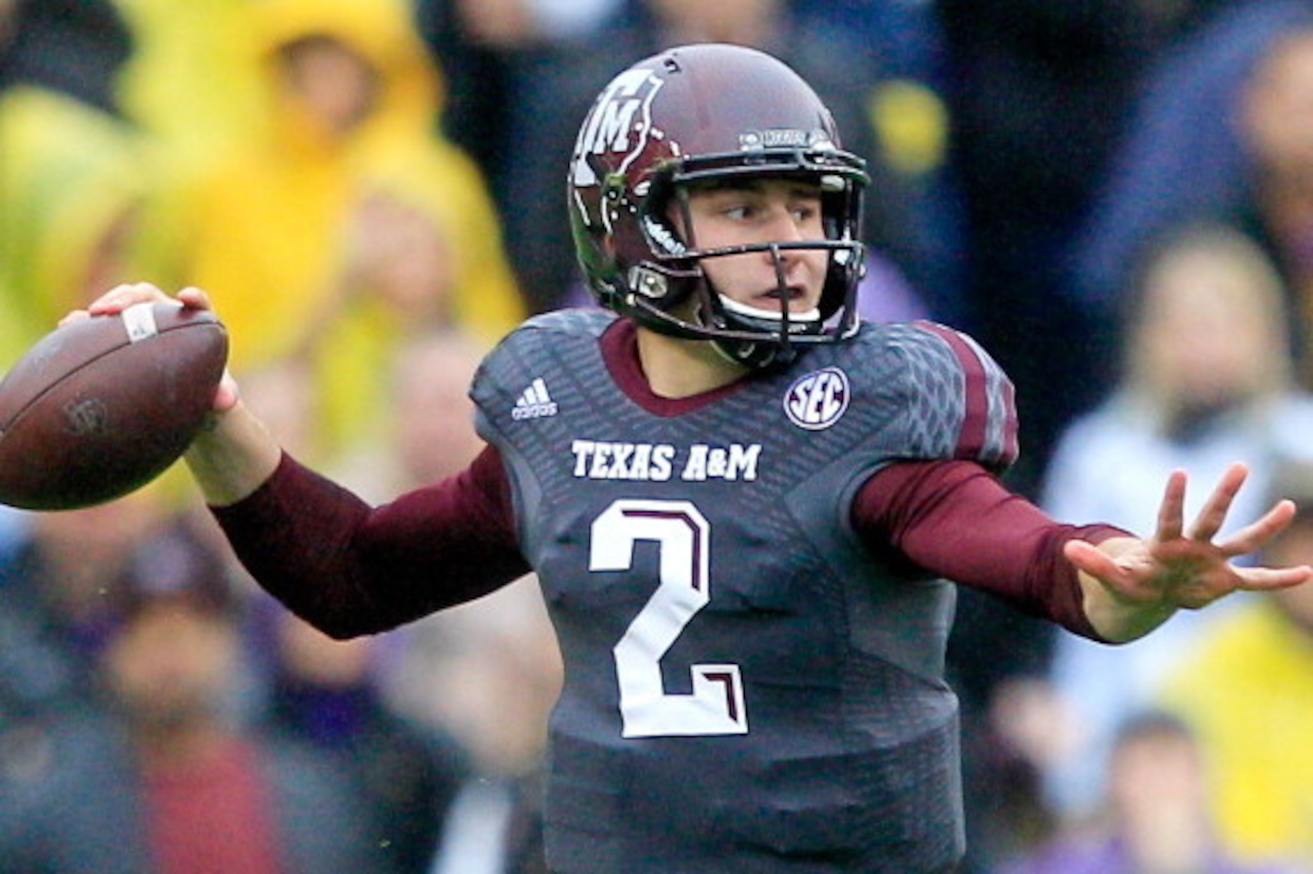 BATON ROUGE, LA - NOVEMBER 23:  Quarterback Johnny Manziel #2 of the Texas A&M Aggies drops back to pass against the LSU Tigers at Tiger Stadium on November 23, 2013 in Baton Rouge, Louisiana.  (Photo by Sean Gardner/Getty Images)