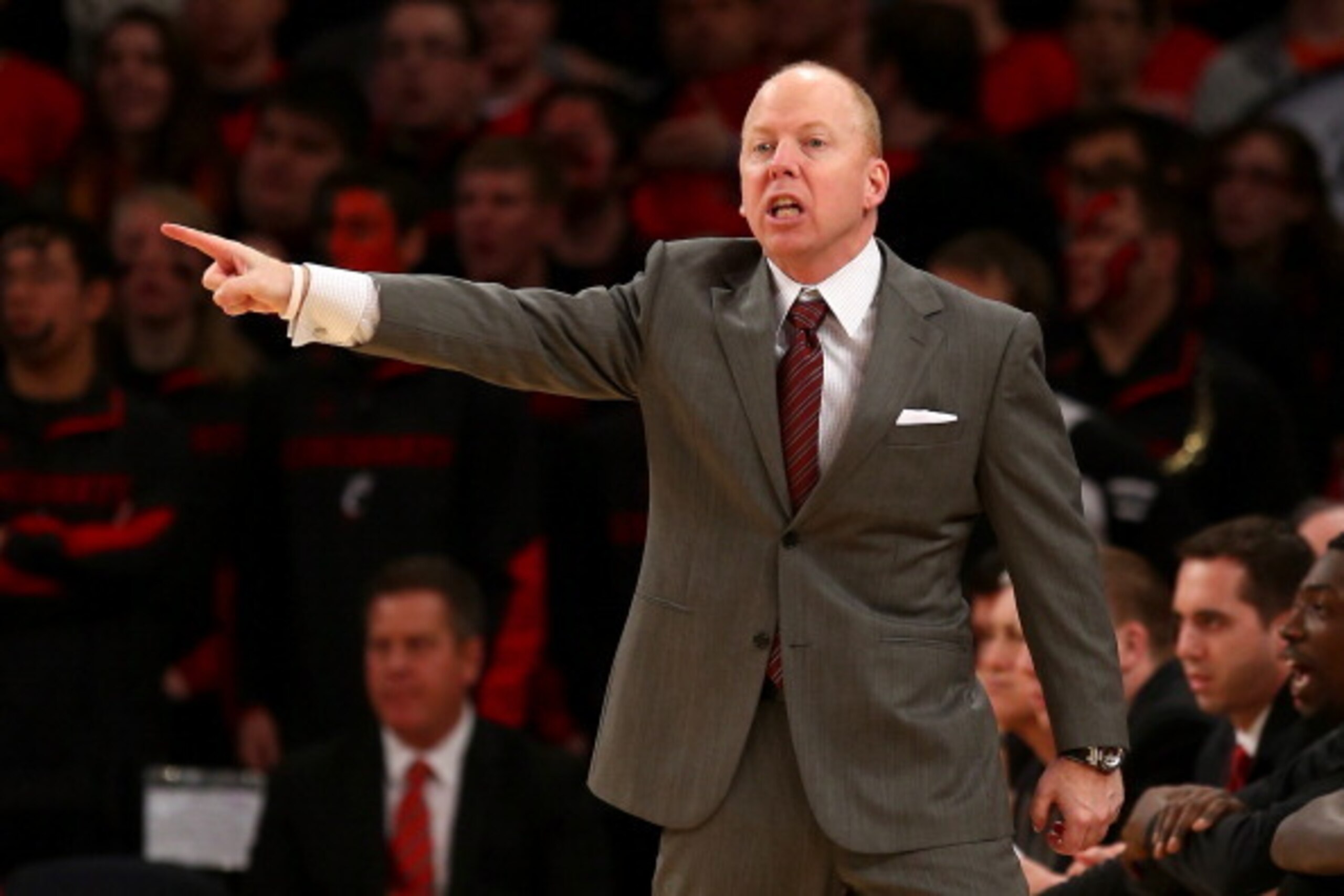 NEW YORK, NY - MARCH 14:  Head coach Mick Cronin of the Cincinnati Bearcats reacts in the first half as he coaches against the Georgetown Hoyas during the quaterfinals of the Big East Men's Basketball Tournament at Madison Square Garden on March 14, 2013 