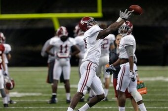 Robert Foster (foreground) redshirted at Alabama in 2013