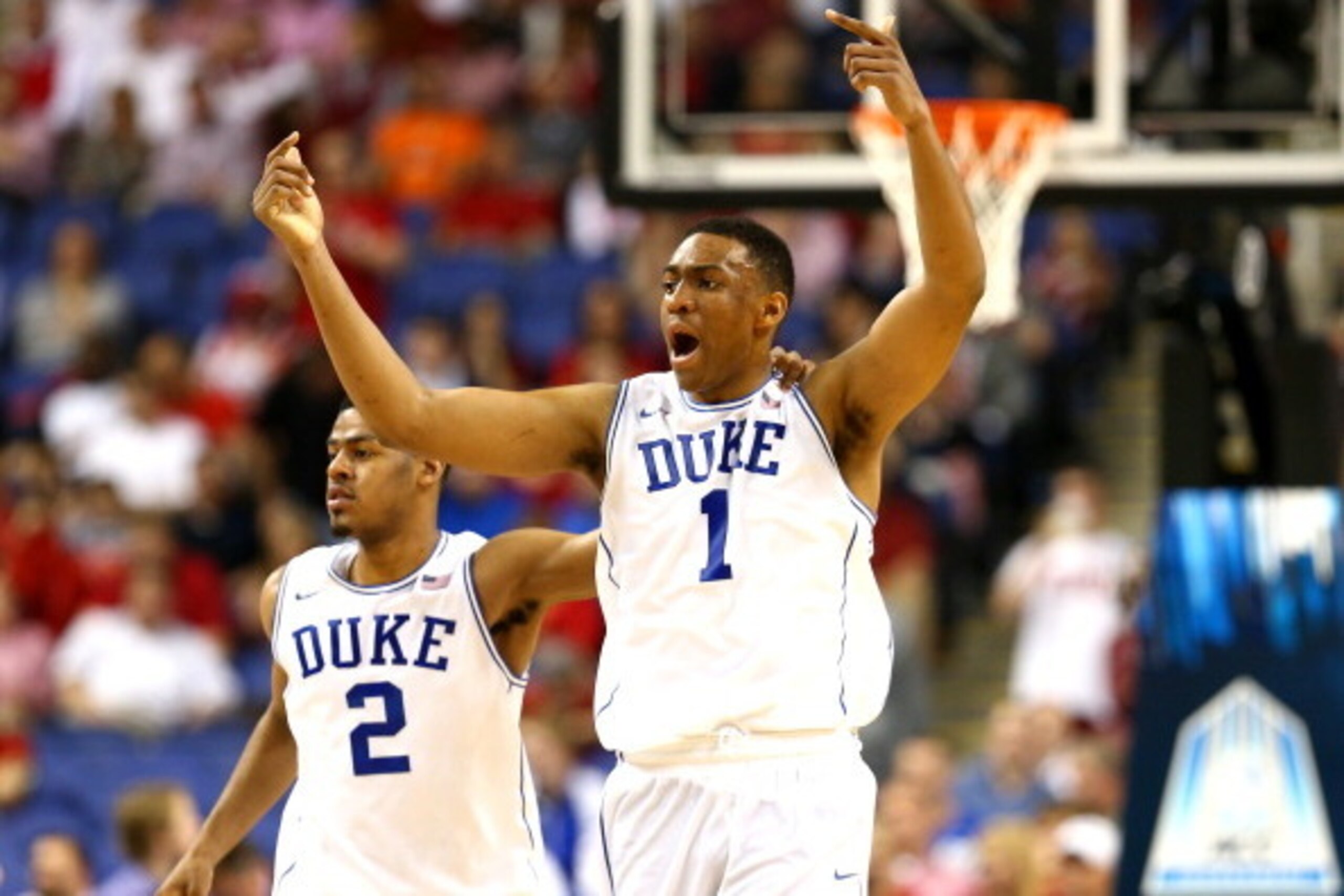 GREENSBORO, NC - MARCH 15:  Teammates Quinn Cook #2 and Jabari Parker #1 of the Duke Blue Devils run down the court against the North Carolina State Wolfpack during the semifinals of the 2014 Men's ACC Basketball Tournament at Greensboro Coliseum on March