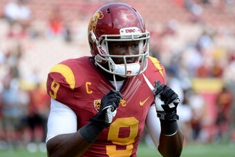 LOS ANGELES, CA - SEPTEMBER 21:  Marqise Lee #9 of the USC Trojans warms up before the game against the Utah State Aggies at the Los Angeles Memorial Coliseum on September 21, 2013 in Los Angeles, California.  (Photo by Harry How/Getty Images)