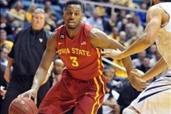 Feb 10, 2014; Morgantown, WV, USA; Iowa State Cyclones forward Melvin Ejim (3) drives against the West Virginia Mountaineers at WVU Coliseum. Mandatory Credit: Dan Friend-USA TODAY Sports Feb 10, 2014; Morgantown, WV, USA; Iowa State Cyclones forward Melvin Ejim (3) drives against the West Virginia Mountaineers at WVU Coliseum. Mandatory Credit: Dan Friend-USA TODAY Sports