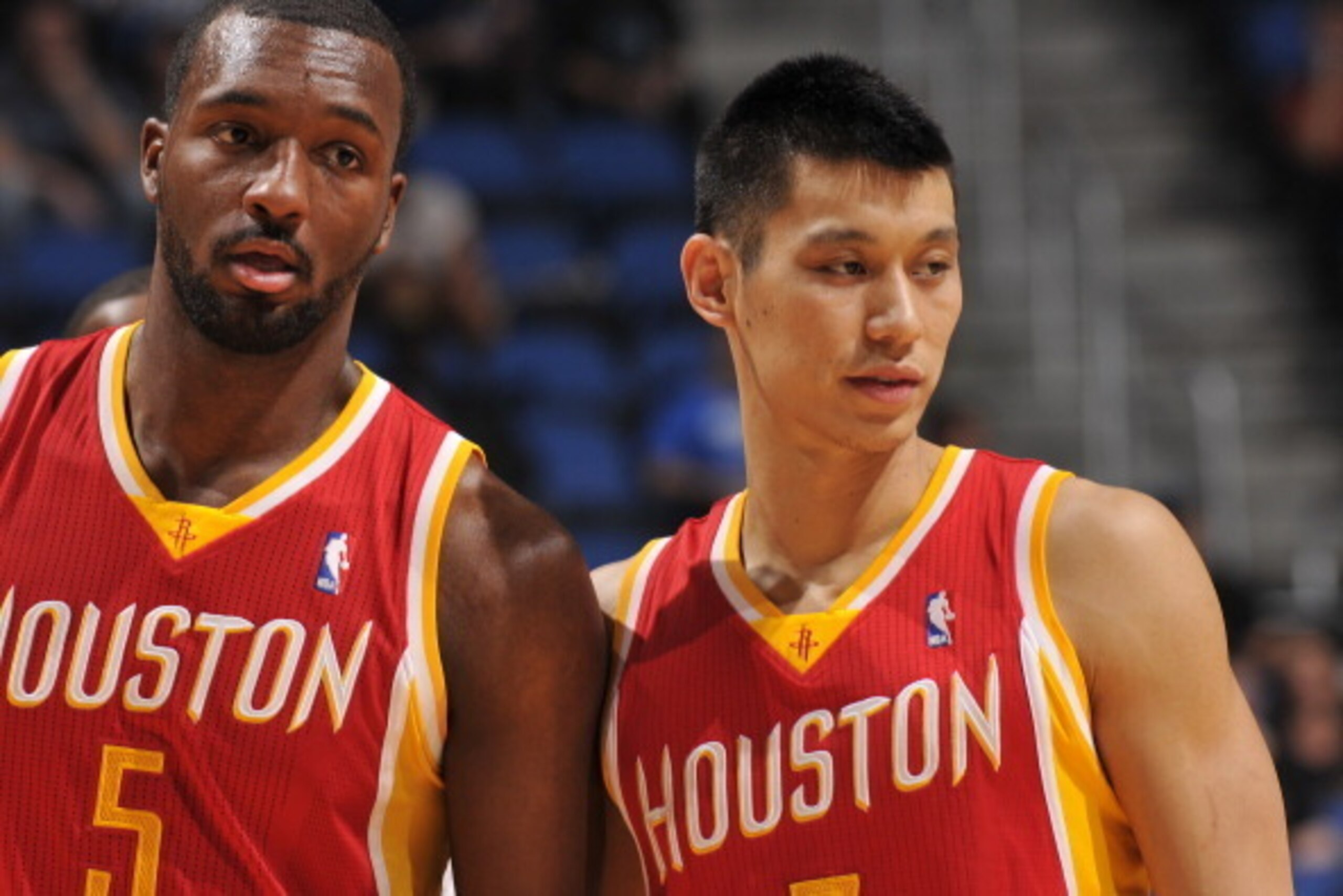 ORLANDO, FL - MARCH 5: Jordan Hamilton #5 and Jeremy Lin #7 of the Houston Rockets look on against the Orlando Magic during the game on March 5, 2014 at Amway Center in Orlando, Florida. NOTE TO USER: User expressly acknowledges and agrees that, by downlo