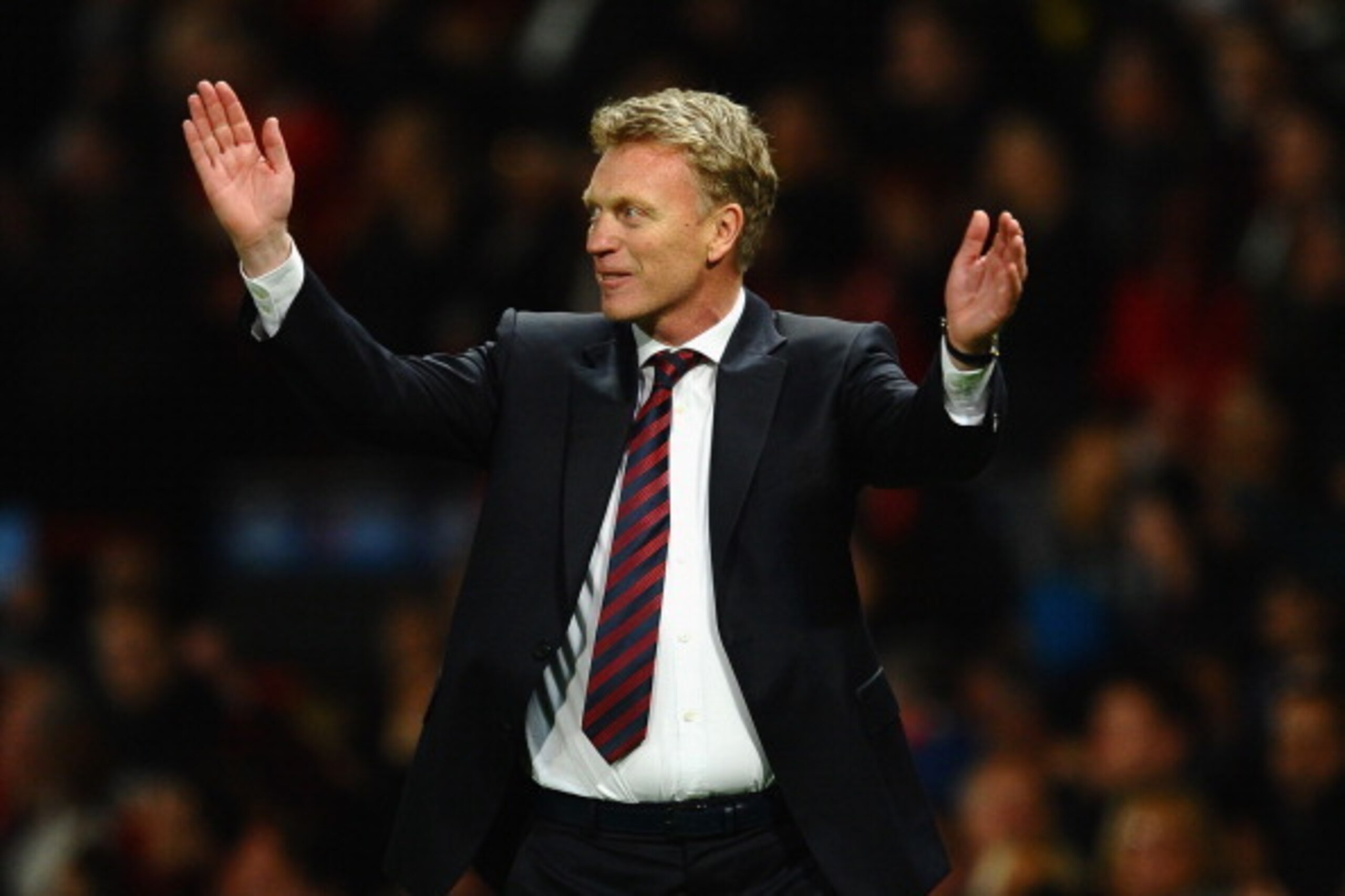 MANCHESTER, ENGLAND - MARCH 19: Manchester United Manager David Moyes celebrates at the end of the UEFA Champions League Round of 16 second round match between Manchester United and Olympiacos FC at Old Trafford on March 19, 2014 in Manchester, England. MANCHESTER, ENGLAND - MARCH 19: Manchester United Manager David Moyes celebrates at the end of the UEFA Champions League Round of 16 second round match between Manchester United and Olympiacos FC at Old Trafford on March 19, 2014 in Manchester, England.
