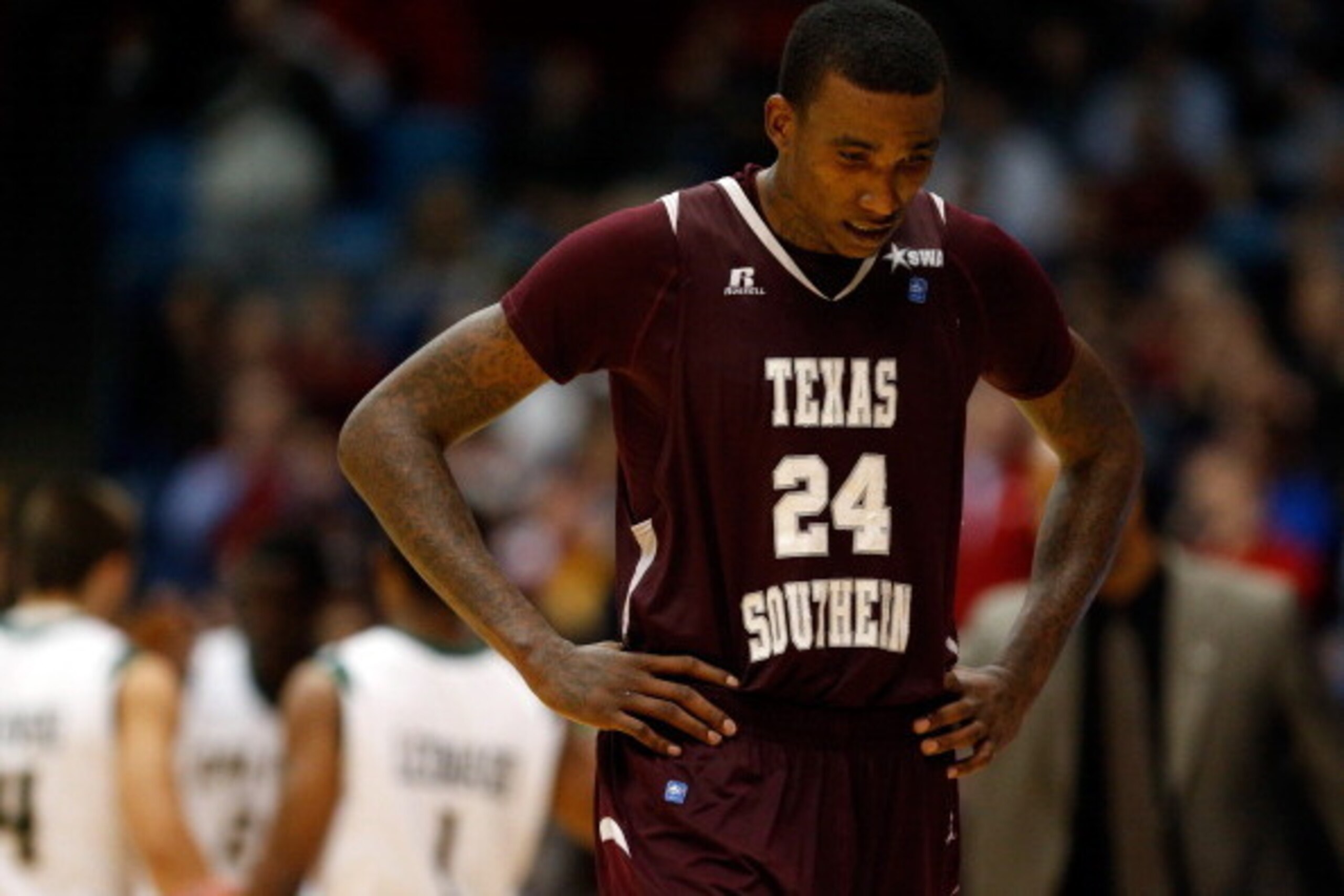 DAYTON, OH - MARCH 19: Aaric Murray #24 of the Texas Southern Tigers walks off the court after losing to the Cal Poly Mustangs 81-69 in the first round of the 2014 NCAA Men's Basketball Tournament at UD Arena on March 19, 2014 in Dayton, Ohio.  (Photo by 