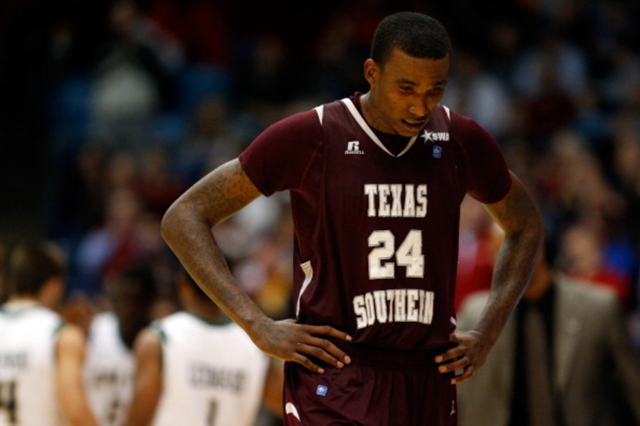 DAYTON, OH - MARCH 19: Aaric Murray #24 of the Texas Southern Tigers walks off the court after losing to the Cal Poly Mustangs 81-69 in the first round of the 2014 NCAA Men's Basketball Tournament at UD Arena on March 19, 2014 in Dayton, Ohio.  (Photo by 