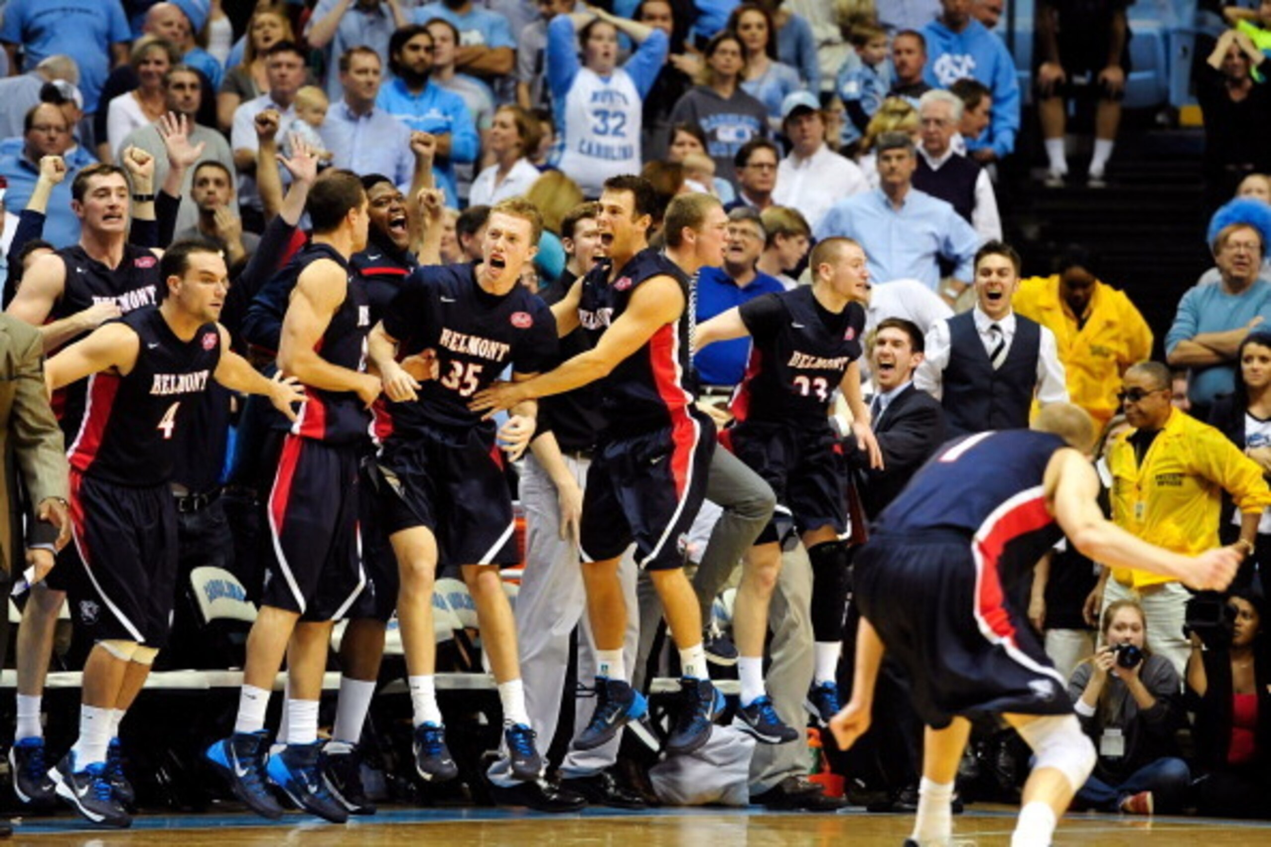 CHAPEL HILL, NC - NOVEMBER 17:  The Belmont Bruins celebrate as time expires in their win over the North Carolina Tar Heels at the Dean Smith Center on November 17, 2013 in Chapel Hill, North Carolina. Belmont defeated North Carolina 83-80.  (Photo by Gra