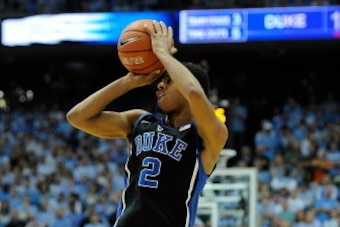 CHAPEL HILL, NC - FEBRUARY 20:  Quinn Cook #2 of the Duke Blue Devils shoots against the North Carolina Tar Heels during their game at the Dean Smith Center on February 20, 2014 in Chapel Hill, North Carolina.  (Photo by Grant Halverson/Getty Images)