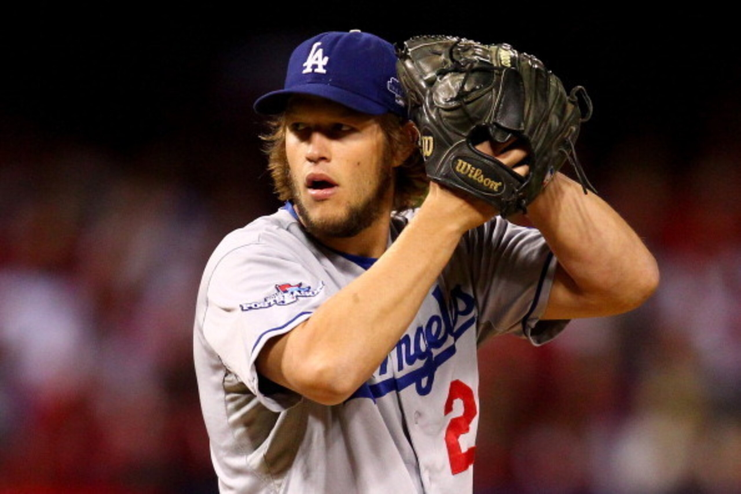 ST LOUIS, MO - OCTOBER 18:  Clayton Kershaw #22 of the Los Angeles Dodgers pitches in the first inning against the St. Louis Cardinals in Game Six of the National League Championship Series at Busch Stadium on October 18, 2013 in St Louis, Missouri.  (Pho