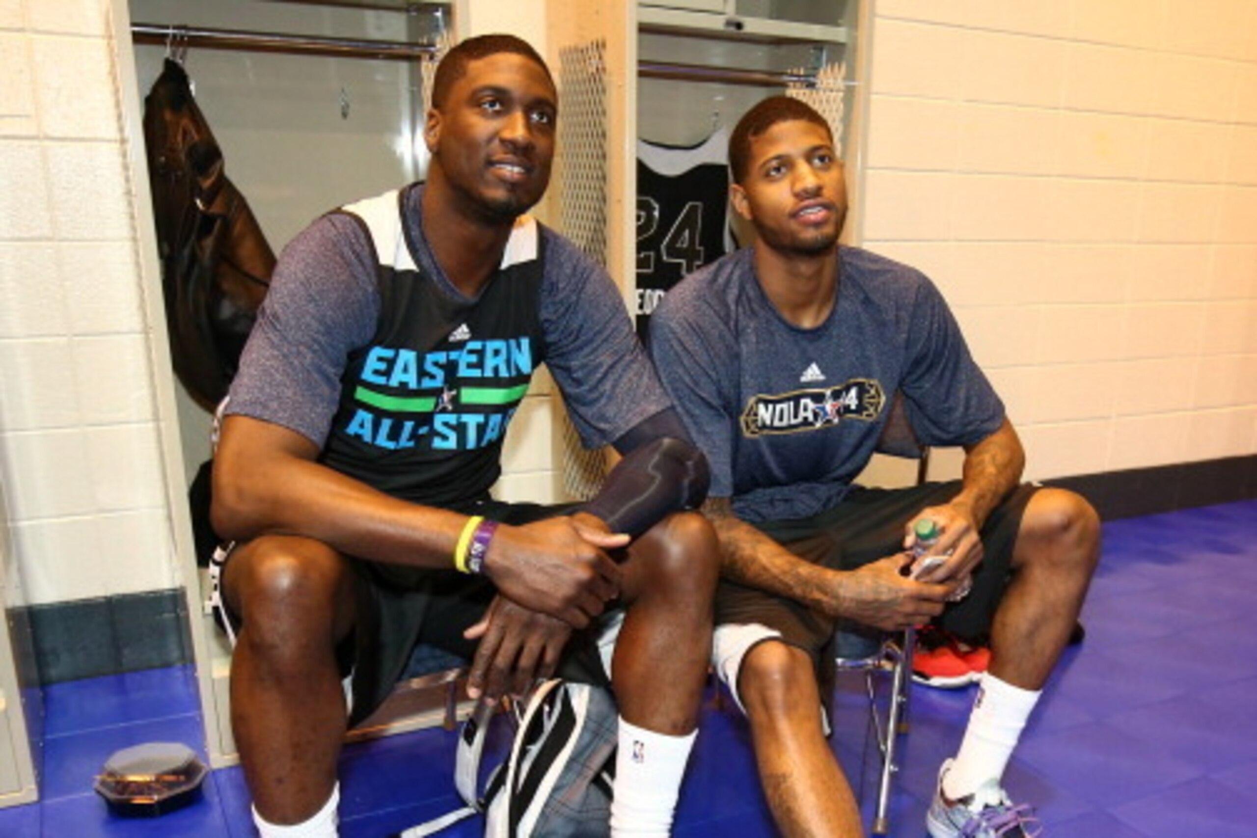 NEW ORLEANS, LA - FEBRUARY 15: Paul George #24 and Roy Hibbert #55 of the Eastern Conference All-Stars sit in the lockerroom during NBA All-Star Practice at Sprint Arena as part of 2014 NBA All-Star Weekend at the Ernest N. Morial Convention Center on Feb
