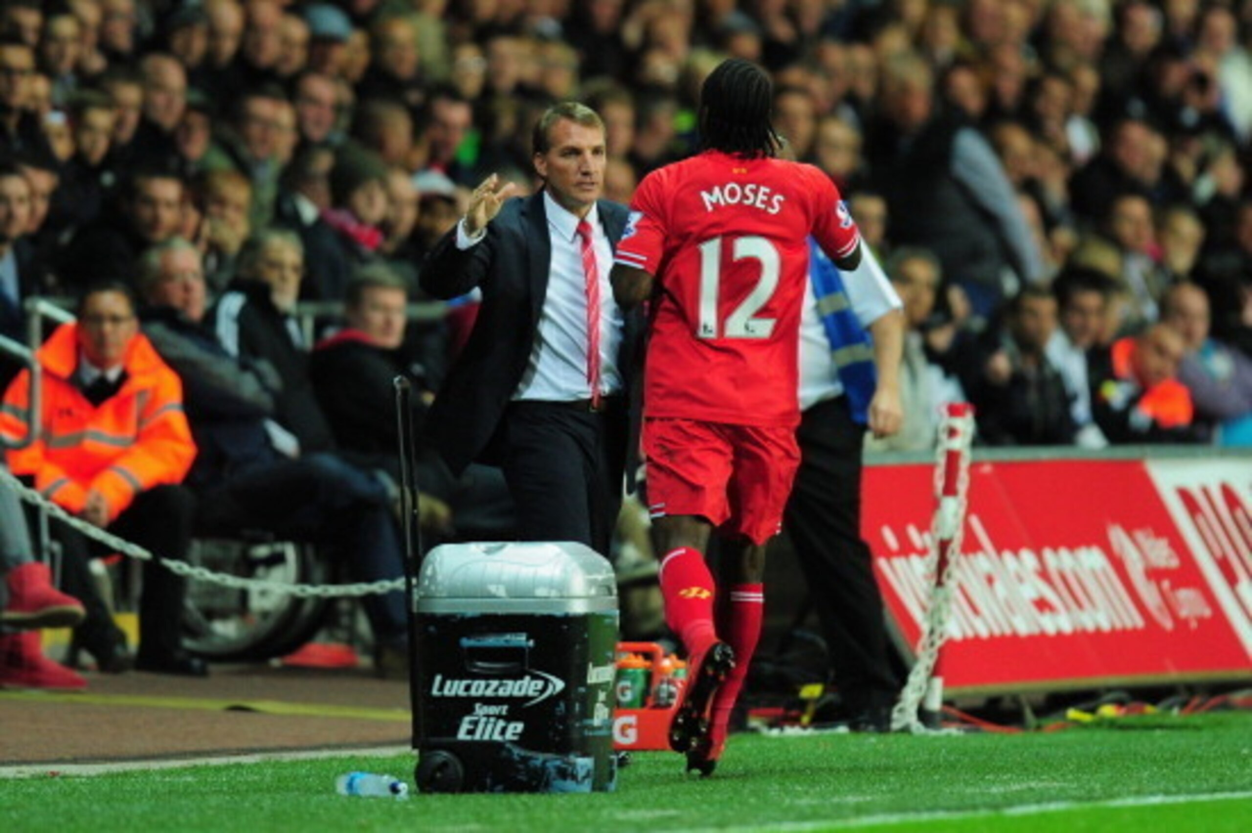 SWANSEA, WALES - SEPTEMBER 16: Liverpool striker Victor Moses (r) celebrates after scoring the second Liverpool goal with manager Brendan Rodgers during the Barclays Premier League match between Swansea City and Liverpool at Liberty Stadium on September SWANSEA, WALES - SEPTEMBER 16: Liverpool striker Victor Moses (r) celebrates after scoring the second Liverpool goal with manager Brendan Rodgers during the Barclays Premier League match between Swansea City and Liverpool at Liberty Stadium on September