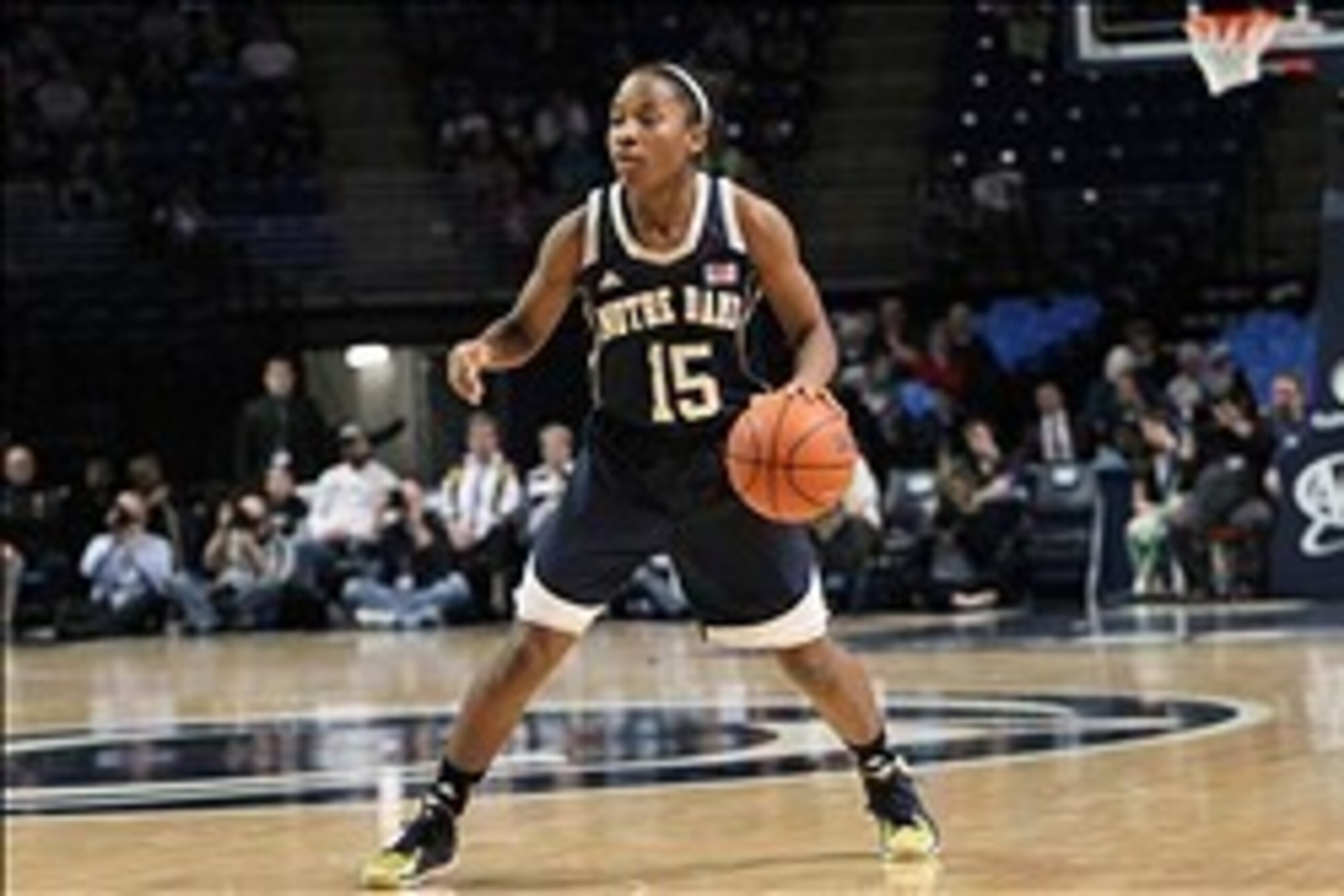 Dec 4, 2013; University Park, PA, USA; Notre Dame Fighting Irish guard Lindsay Allen (15) dribbles the ball during the second half against the Penn State Lady Lions at Bryce Jordan Center. Notre Dame defeated Penn State 77-67. Mandatory Credit: Matthew O'