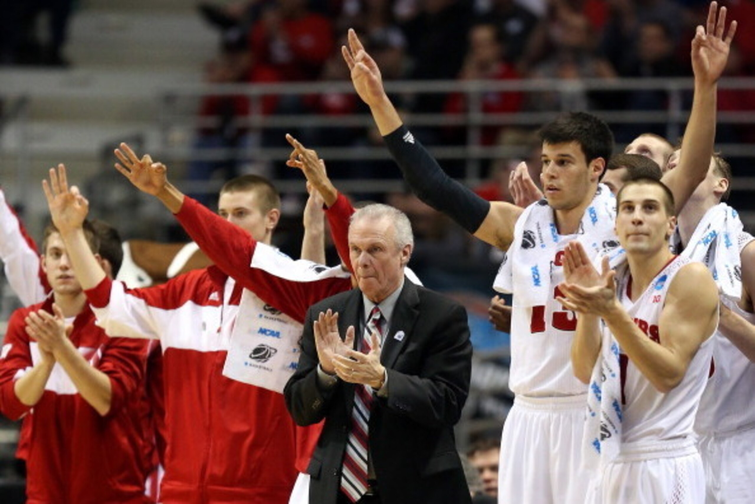 MILWAUKEE, WI - MARCH 20: Head coach Bo Ryan of the Wisconsin Badgers applauds from the bench alongside players during the second round game of the NCAA Basketball Tournament against the American University Eagles at BMO Harris Bradley Center on March 20 MILWAUKEE, WI - MARCH 20: Head coach Bo Ryan of the Wisconsin Badgers applauds from the bench alongside players during the second round game of the NCAA Basketball Tournament against the American University Eagles at BMO Harris Bradley Center on March 20