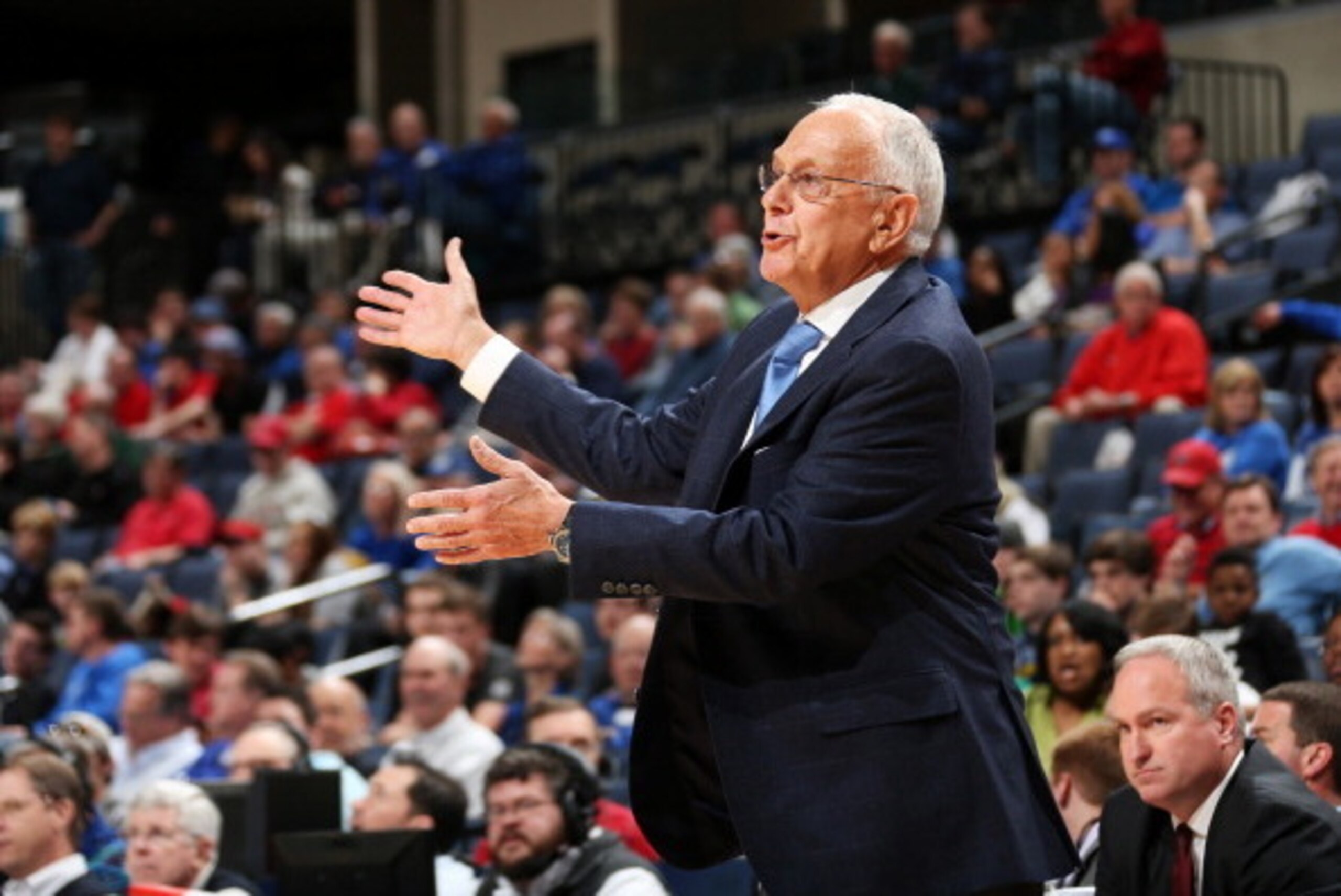 MEMPHIS, TN - MARCH 13: Larry Brown, head coach of the SMU Mustangs motions from the bench against the Houston Cougars during the quarterfinal round of the American Athletic Conference Tournament at FedExForum on March 13, 2014 in Memphis, Tennessee. Hous