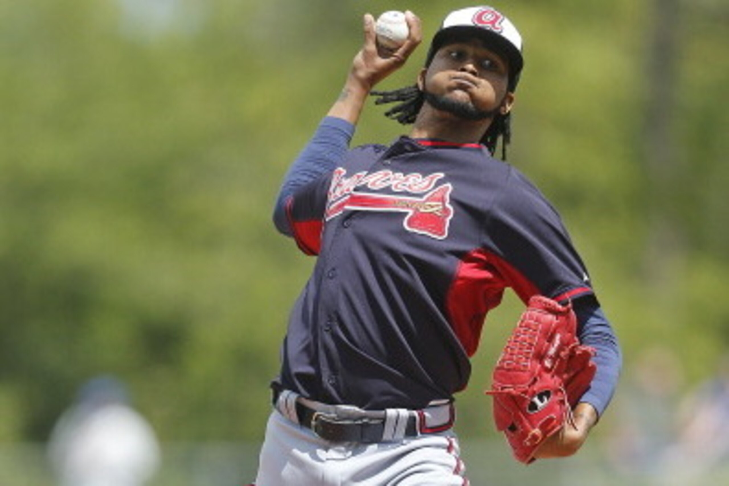 PORT ST. LUCIE, FL - MARCH 20: Ervin Santana #30 of the Atlanta Braves throws the ball against the New York Mets in the first inning during a spring training game at Tradition Field on March 20, 2014 in Port St. Lucie, Florida.  (Photo by Joel Auerbach/Ge