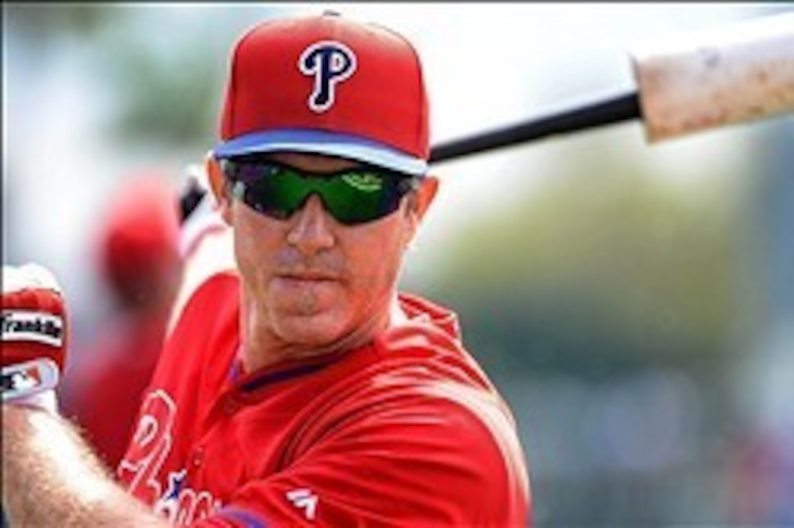 Mar 12, 2014; Sarasota, FL, USA; Philadelphia Phillies second basemen Chase Utley (26) warms up before the start of the spring training exhibition game against Baltimore Orioles at Ed Smith Stadium. Mandatory Credit: Jonathan Dyer-USA TODAY Sports