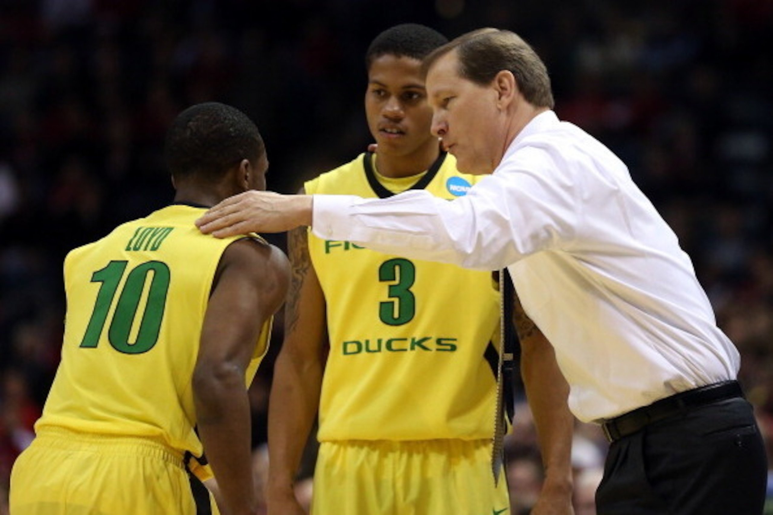 MILWAUKEE, WI - MARCH 20: Head coach Dana Altman of the Oregon Ducks talks with Joseph Young #3, and Johnathan Loyd #10 during the second round game of NCAA Basketball Tournament against the Brigham Young Cougars at BMO Harris Bradley Center on March 20, MILWAUKEE, WI - MARCH 20: Head coach Dana Altman of the Oregon Ducks talks with Joseph Young #3, and Johnathan Loyd #10 during the second round game of NCAA Basketball Tournament against the Brigham Young Cougars at BMO Harris Bradley Center on March 20,