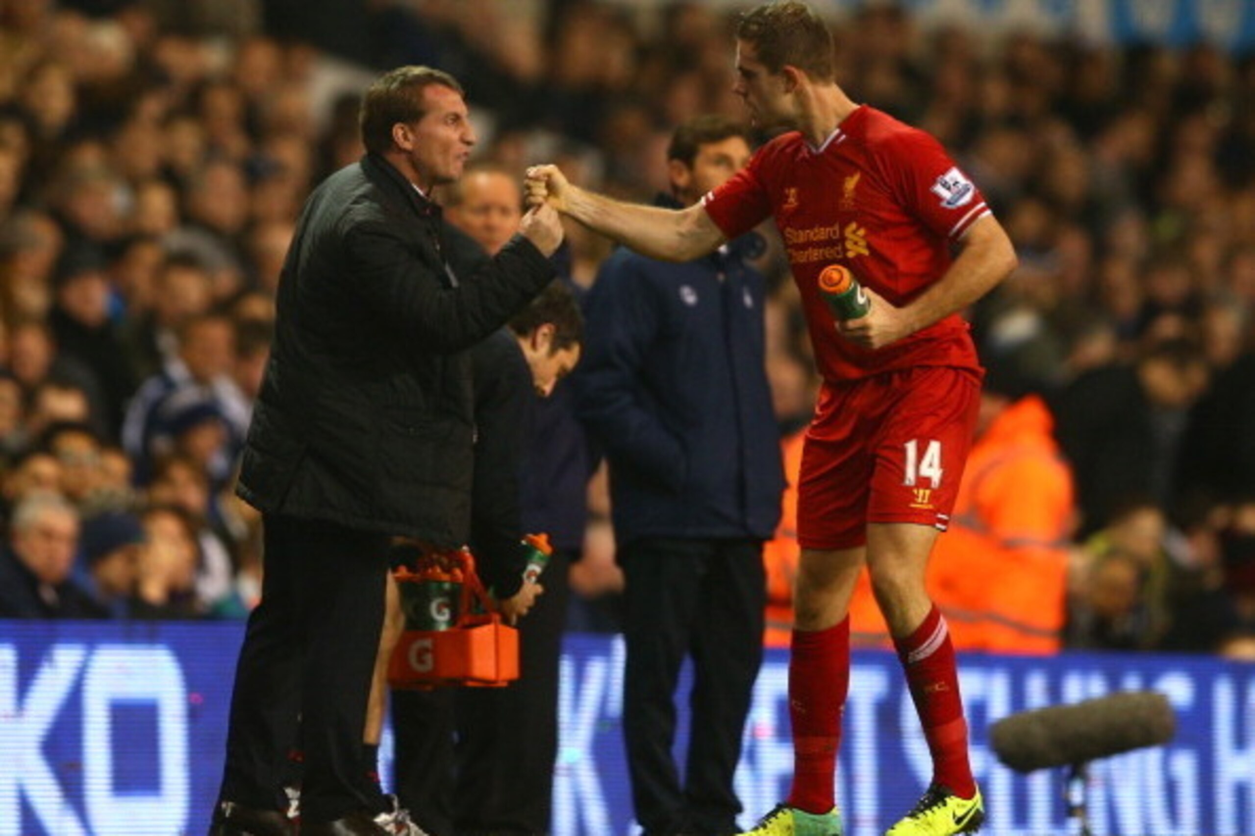 LONDON, ENGLAND - DECEMBER 15:  Manager Brendan Rodgers of Liverpool congratulates Jordan Henderson of Liverpool on scoring their second goal during the Barclays Premier League match between Tottenham Hotspur and Liverpool at White Hart Lane on December 1