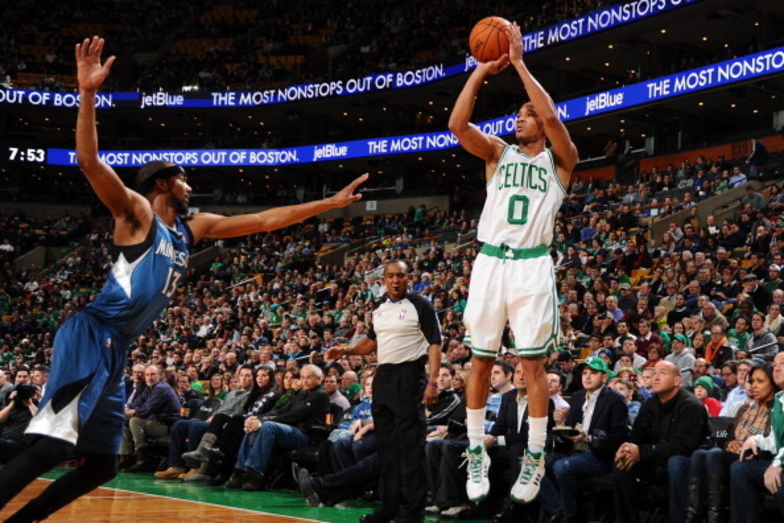 BOSTON, MA - DECEMBER 16: Avery Bradley #0 of the Boston Celtics shoots the ball against Corey Brewer #13 of the Minnesota Timberwolves on December 16, 2013 at the TD Garden in Boston, Massachusetts.  NOTE TO USER: User expressly acknowledges and agrees t