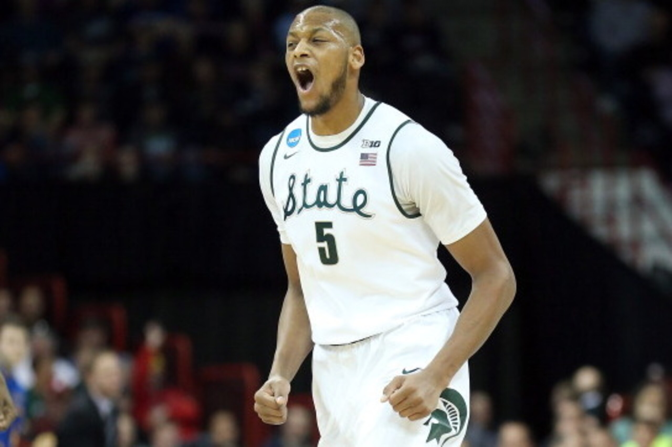 SPOKANE, WA - MARCH 20:  Adreian Payne #5 of the Michigan State Spartans reacts during their game against the Delaware Fightin Blue Hens the second round of the 2014 NCAA Men's Basketball Tournament at Spokane Veterans Memorial Arena on March 20, 2014 in 